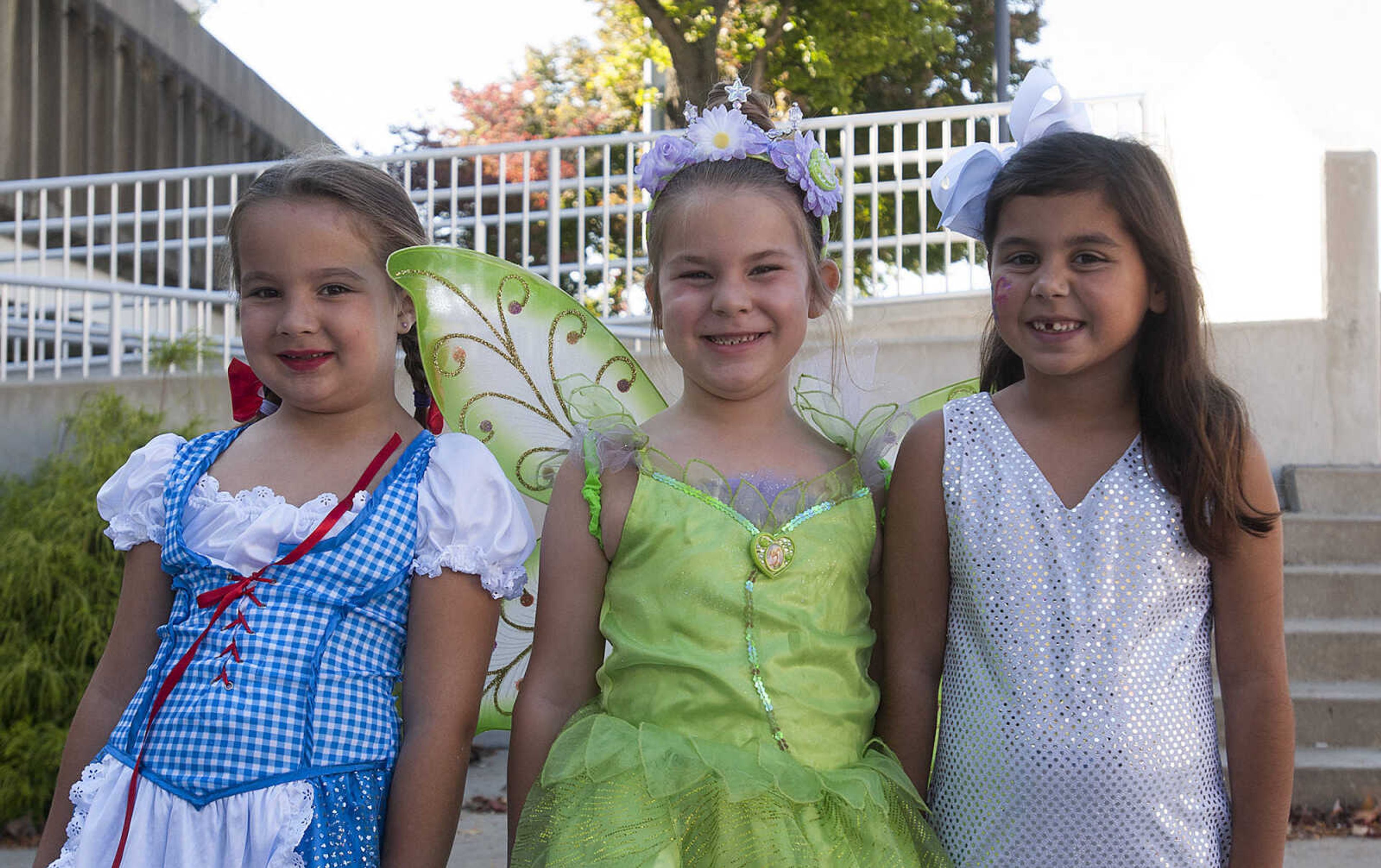 Emma Green, 6, left, Marandia Rhodes, 6, and Sophie Gold, 6, at the fifth annual Halloween Science Night Sunday, Oct. 20, on the campus of Southeast Missouri State University.