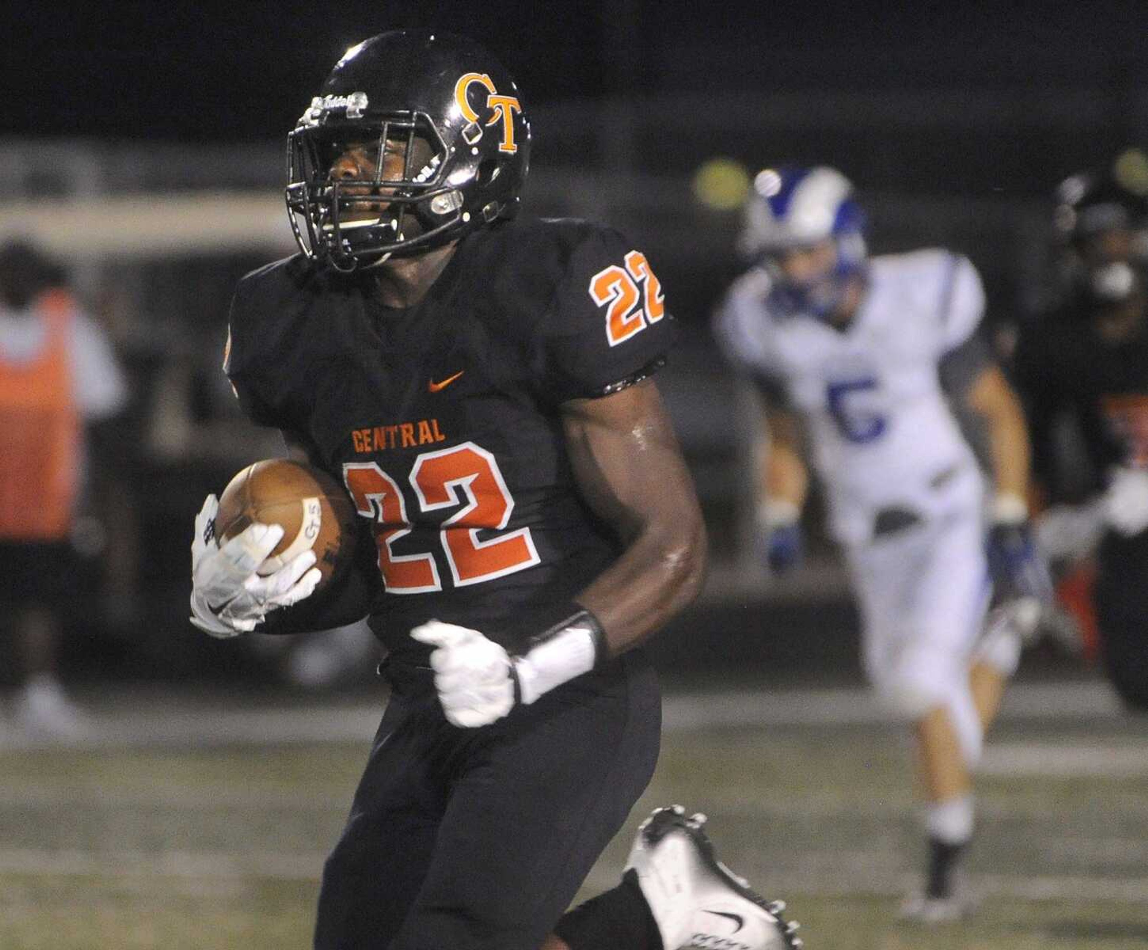 Cape Central's Aaron Harris carries for a 69-yard run against LaDue during the first quarter Friday, Sept. 18, 2015 at Central High School.