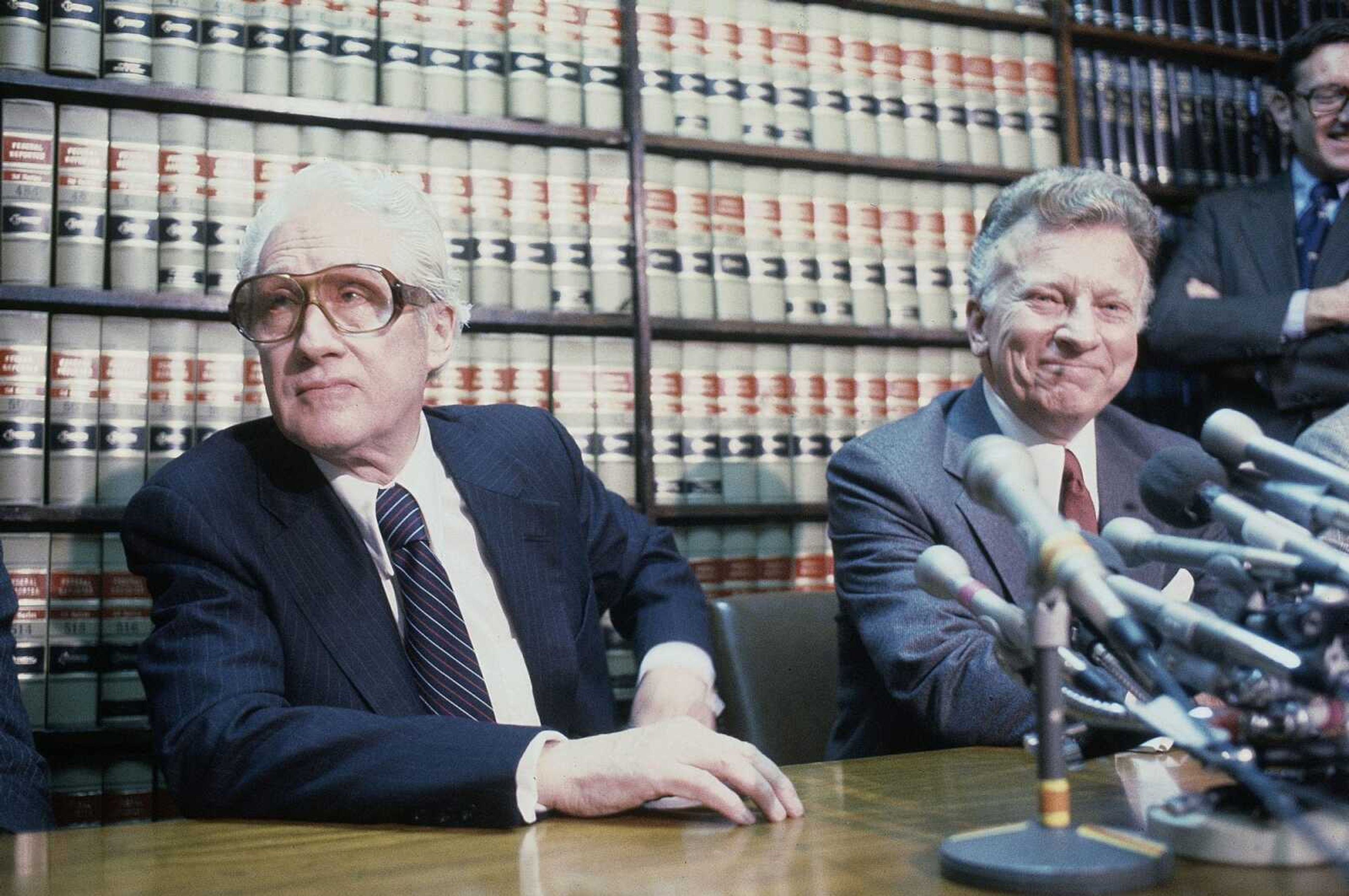 Former FBI officials, Mark Felt, left, and Edward S. Miller, appear at a news conference April 15, 1981, after learning President Ronald Reagan had pardoned them from their convictions of unauthorized break-ins during the Nixon administration's search for opponents during the Vietnam War. Felt revealed himself as "Deep Throat" 30 years after he tipped off Washington Post reporters Bob Woodward and Carl Bernstein in the Watergate investigation and the wrongdoing by President Richard Nixon and his allies.