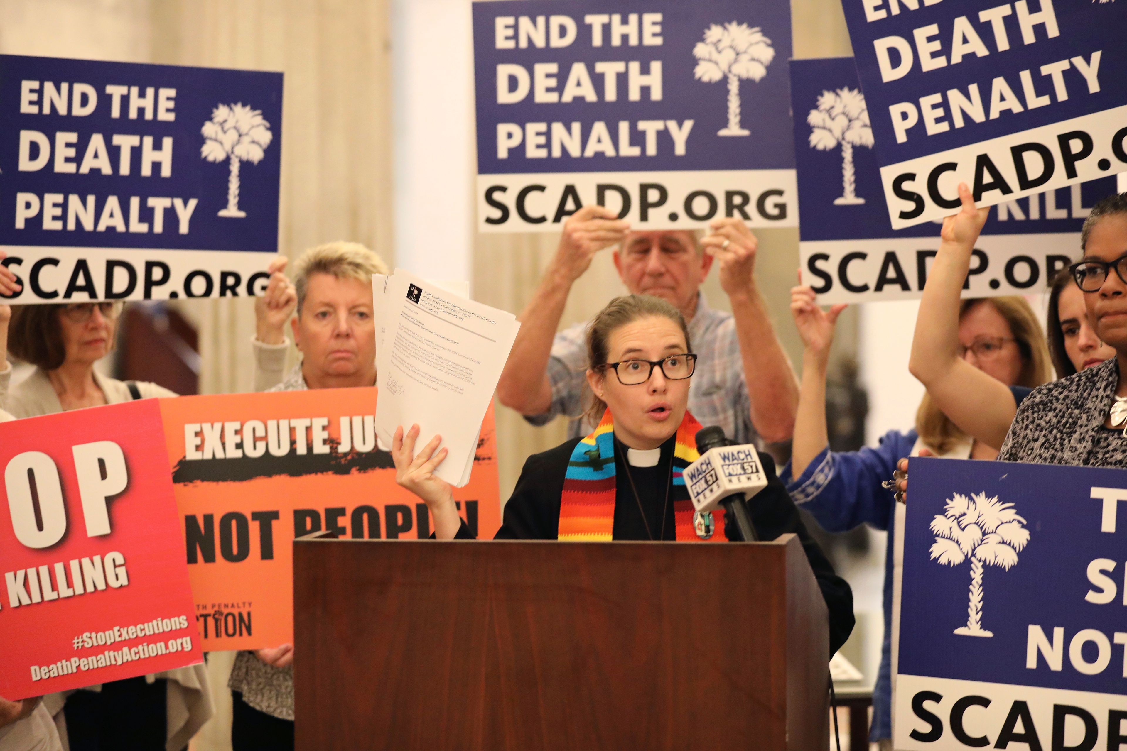 South Carolinians for Alternatives to the Death Penalty Executive Director Rev. Hillary Taylor speaks at a news conference before delivering petitions to stop the execution of Freddie Owens at the South Carolina Statehouse in Columbia, S.C., Thursday, Sept. 19, 2024. (AP Photo/Jeffrey Collins)