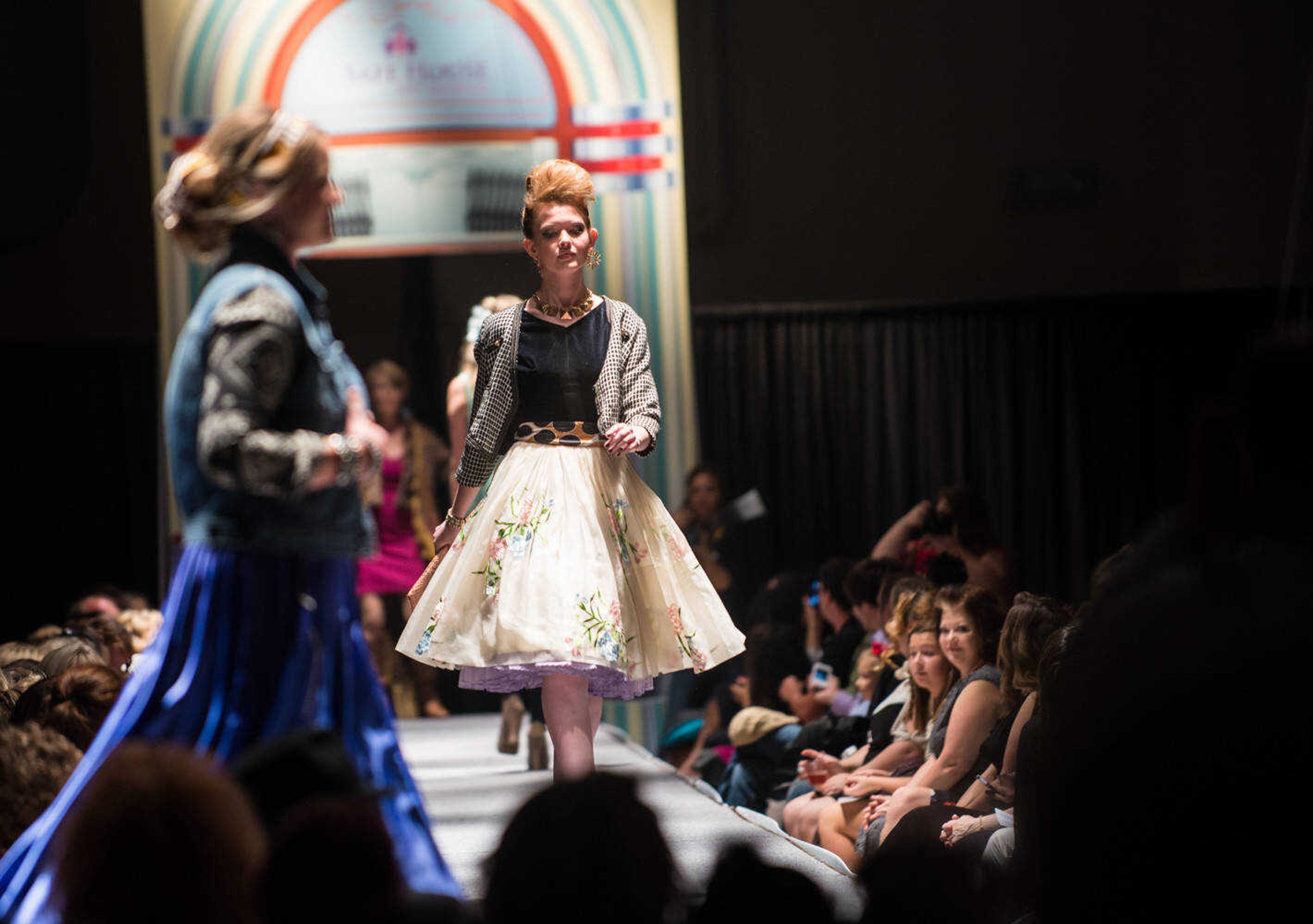 AARON EISENHAUER ~ photos@semissourian.com
Hayley Keith walks the runway with 39 other models during the fifth annual VintageNOW fashion show, a fundraiser for Safe House for Women, at the Osage Centre on Friday, October 17, 2014.