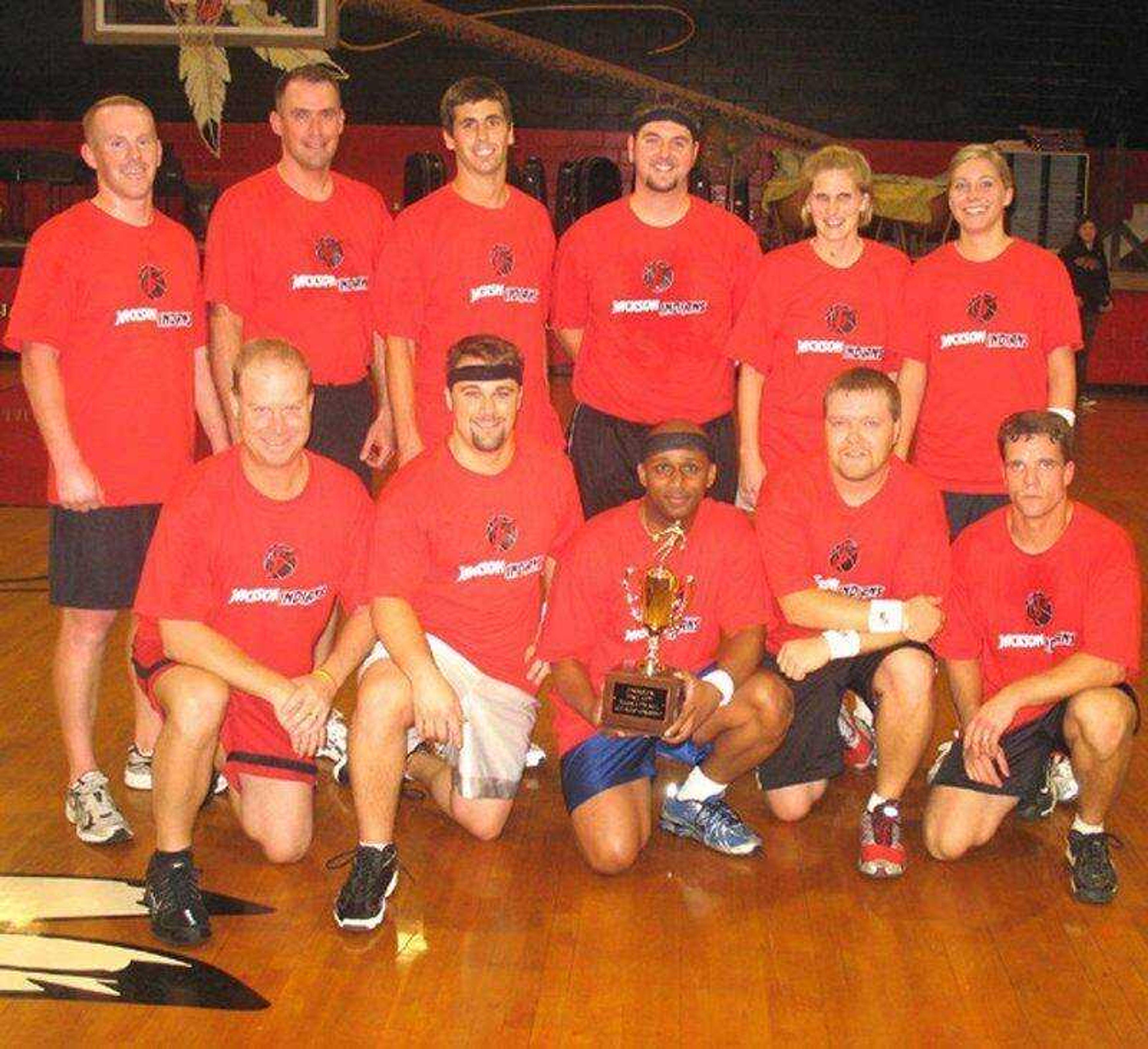 The Red team, with faculty members from the elementary and middle schools, won Jackson's inaugural faculty basketball game. Members of the team, from left: Front &#8212; John Keith, Paul Schorey, Scott McMullen, Josh Adams, Reagan McDowell; Back &#8212; Mike Gross, Dr. Andrew Rogers, Zach Walton, Rob French, Traci Grunloh and Christa Millham. (Submitted photo)