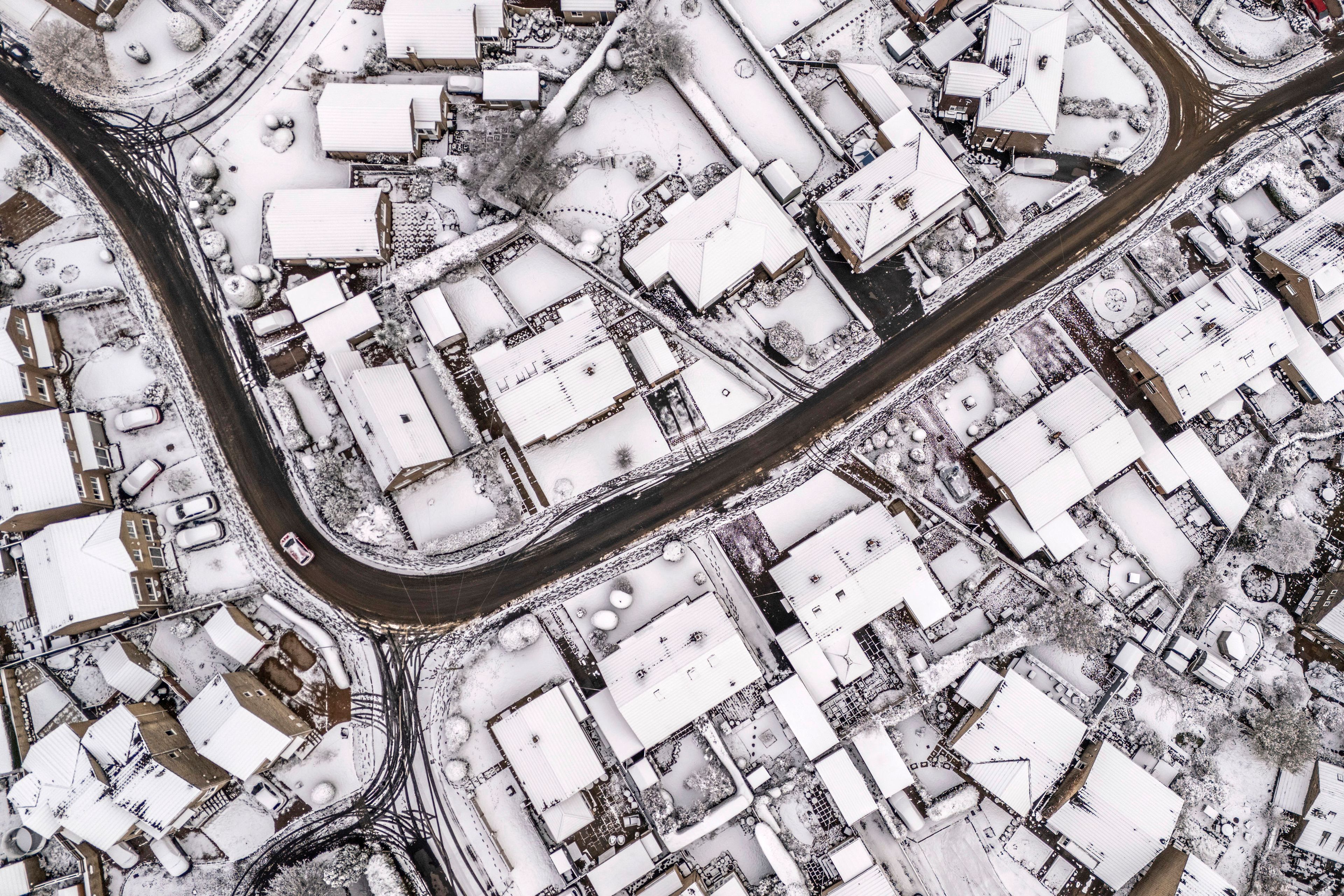 An aerial view of the snow in Holmfirth, west Yorkshire, Tuesday Nov. 19, 2024. (Danny Lawson/PA via AP)