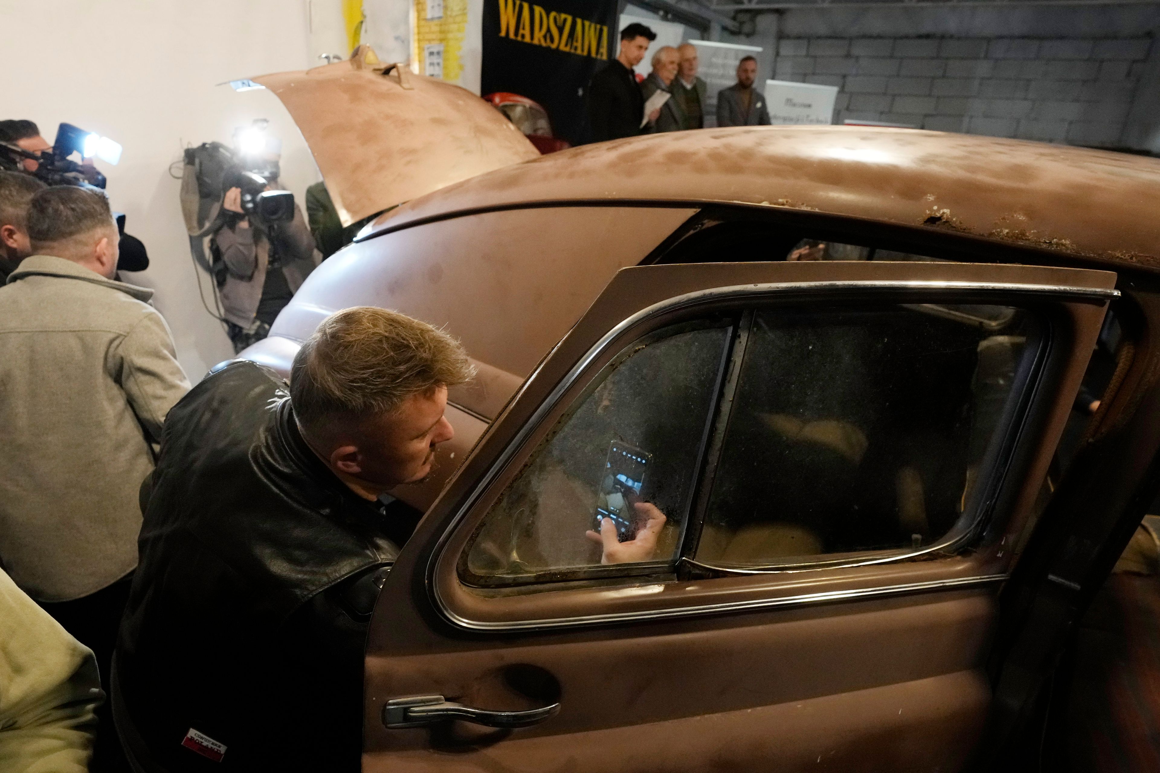 This Warszawa M-20 car with serial number 000001, based on a Soviet Union's model, was the first vehicle to leave a car factory in Poland after World War II, on Nov. 6, 1951 and now, 73 years later, it goes on public display at a private museum in Otrebusy, central Poland, on Wednesday, Nov. 6, 2024. (AP Photo/Czarek Sokolowski)