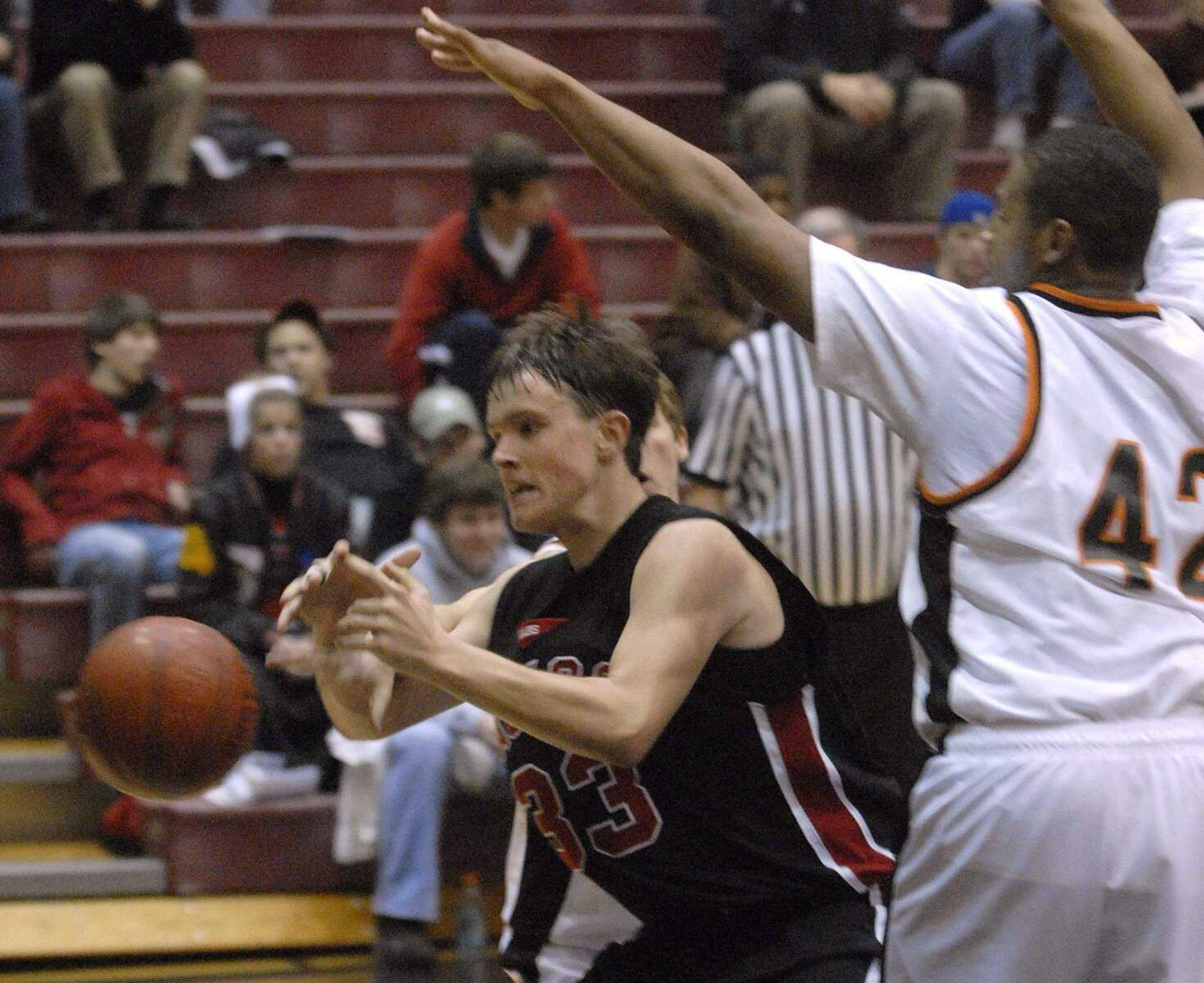 FRED LYNCH ~ flynch@semissourian.com
Jackson's Bobby Clark has the ball knocked out of bounds by Central in the third quarter at the SEMO Conference tournament in Sikeston.