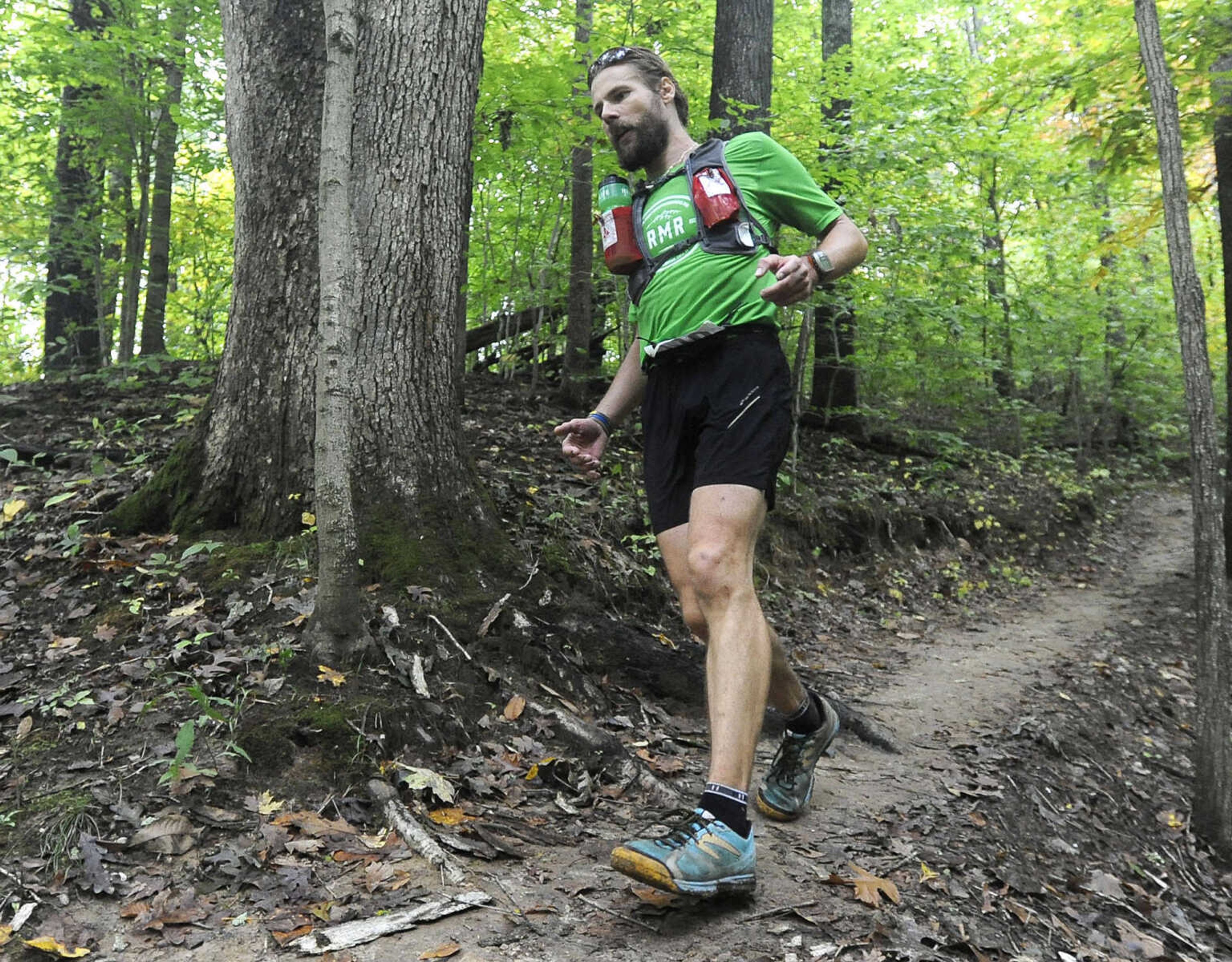 FRED LYNCH ~ flynch@semissourian.com
Filip Boelen approaches the trail head after running through Sheppard Point Trail during the first Trail of Tears 50k event Sunday, Oct. 12, 2014 at Trail of Tears State Park.