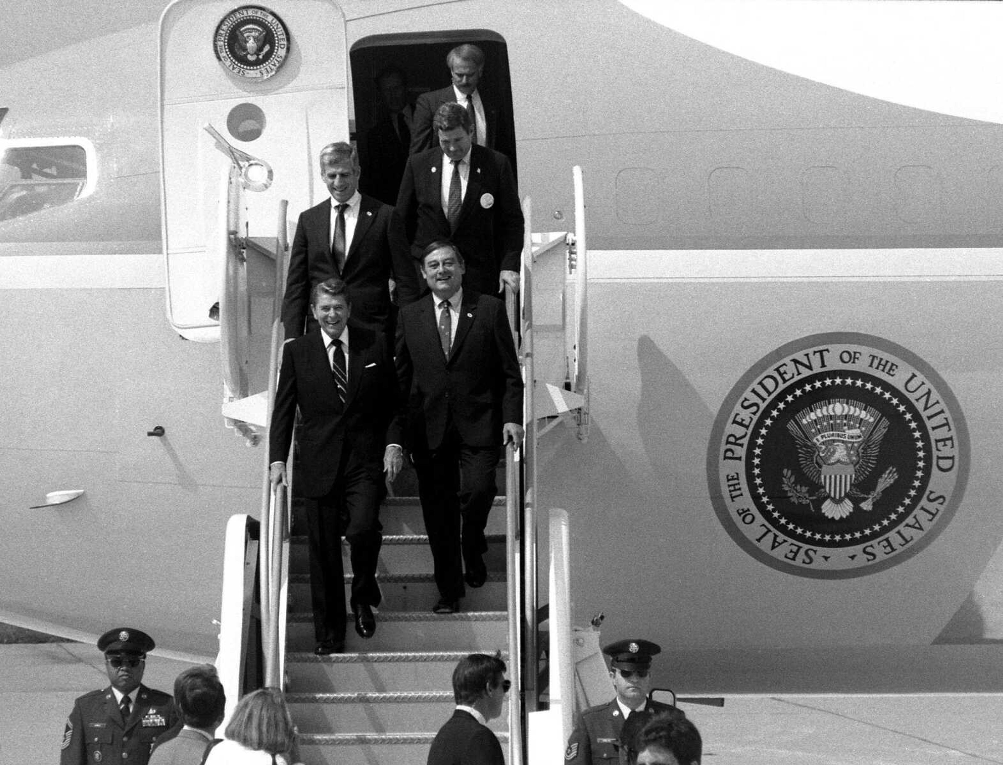 Southeast Missourian archive
President Ronald Reagan arrives in Cape Girardeau aboard Air Force One on Sept. 14, 1988. Coming off the plane with the president at Cape Girardeau Municipal Airport are Congressman Bill Emerson of Cape Girardeau, front right; U.S. Senator John Danforth, rear left; and U.S. Senator Christopher "Kit" Bond, rear right.