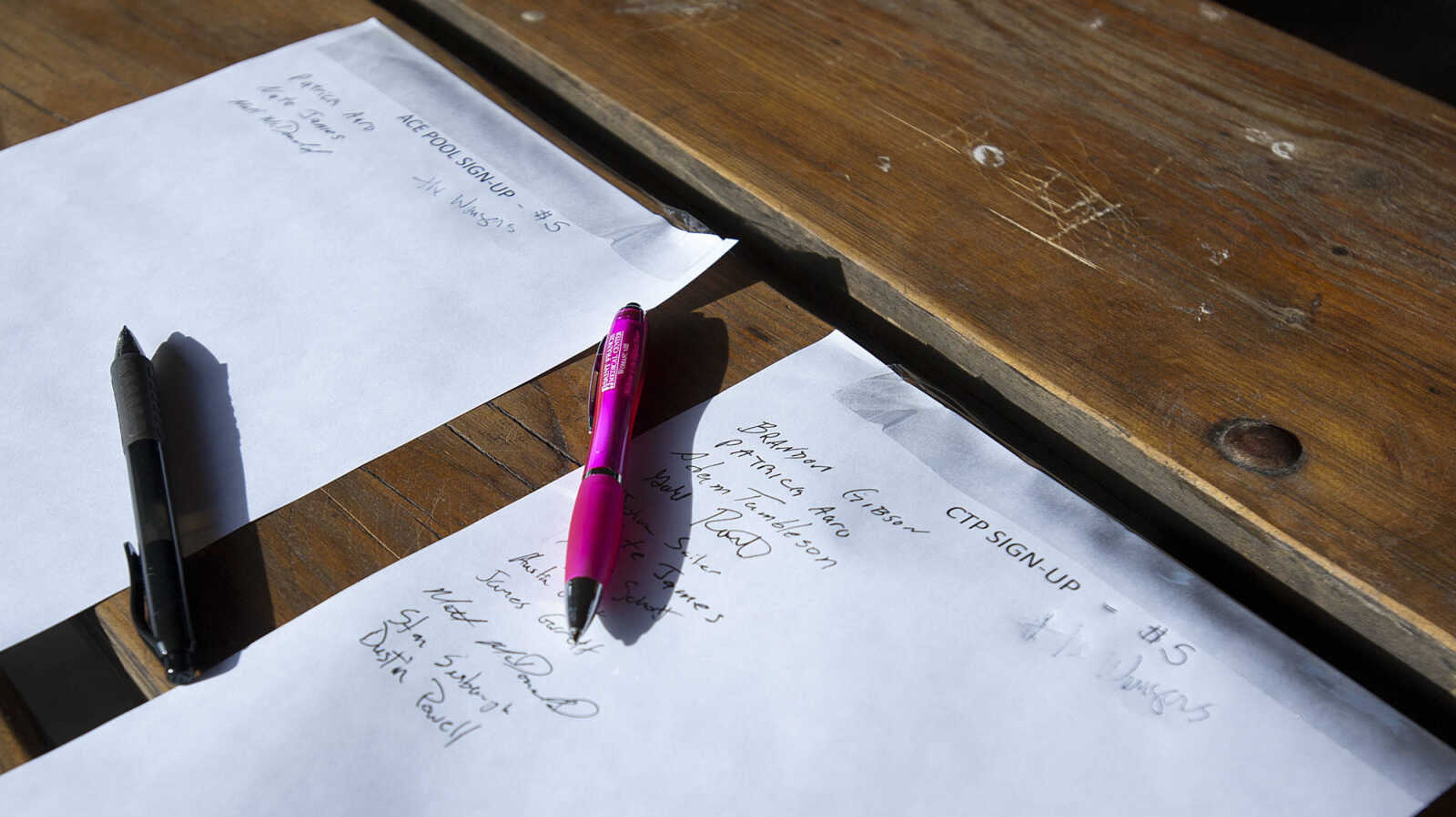 Participants sign up before the start of the Fountain of Life Disc Golf Tournament Sunday, Nov. 24, at Capaha Park in Cape Girardeau. Stroup estimated that approximately 30 people played in the tournament which raised around $2,500 which will go towards construction of a fresh water well for a village in Swaziland, Africa.