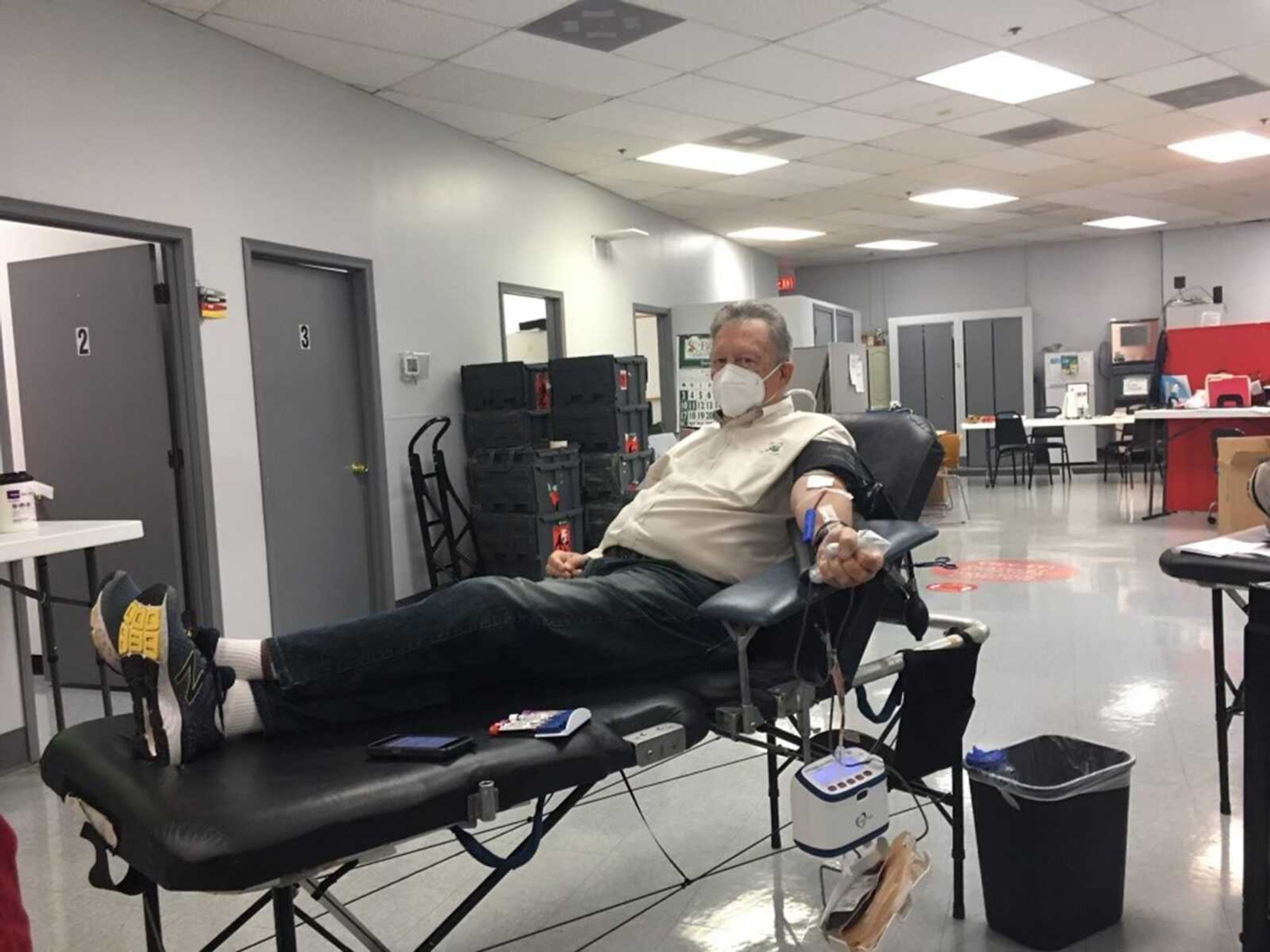 A volunteer gives blood at a recent American Red Cross blood drive.