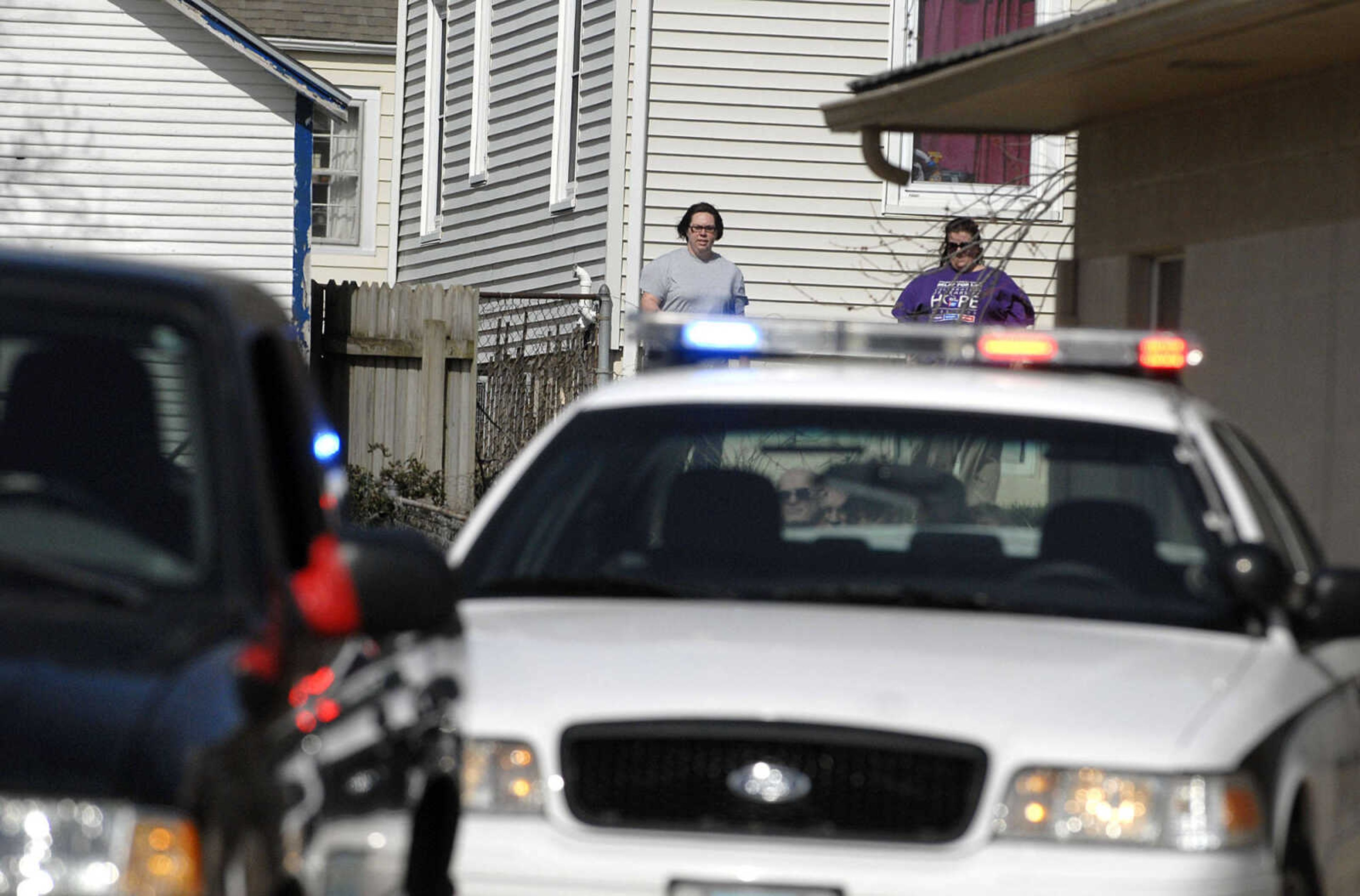 LAURA SIMON ~ lsimon@semissourian.com
Cape Girardeau emergency responders work the scene of a victim of a self-inflicted gun shot wound outside Dan's Key and Lock Tuesday afternoon, March 6, 2012. Police say the man is a suspect in a Sunday assault along Cape LaCroix Recreational Trail.