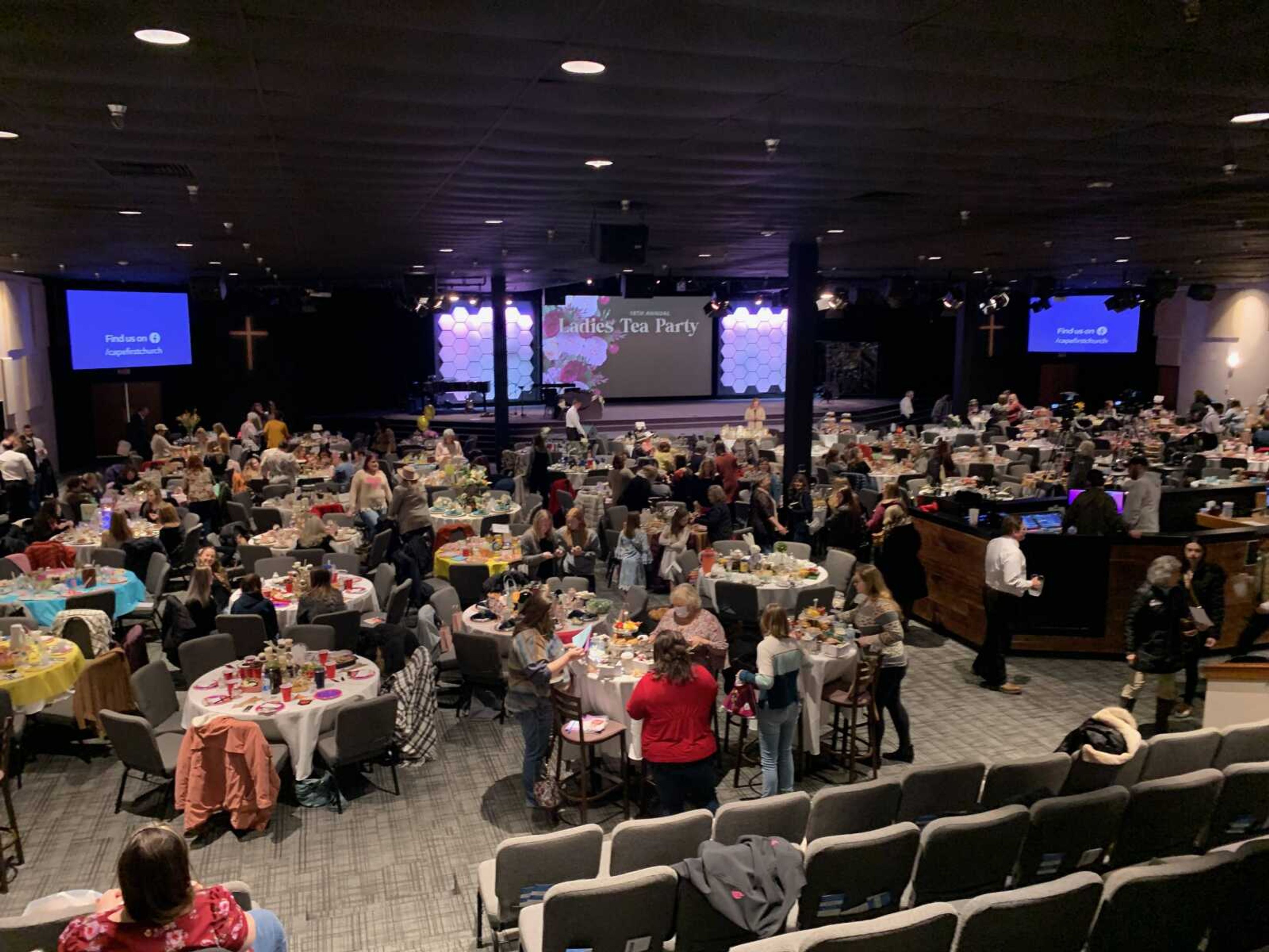 Cape First's auditorium was filled with tables topped with decorations, desserts and fruit as attendees of the ladies event began to make their way inside. Prior to the event, ladies could book seats at the tables, an entire table or seats in the risers were also available.