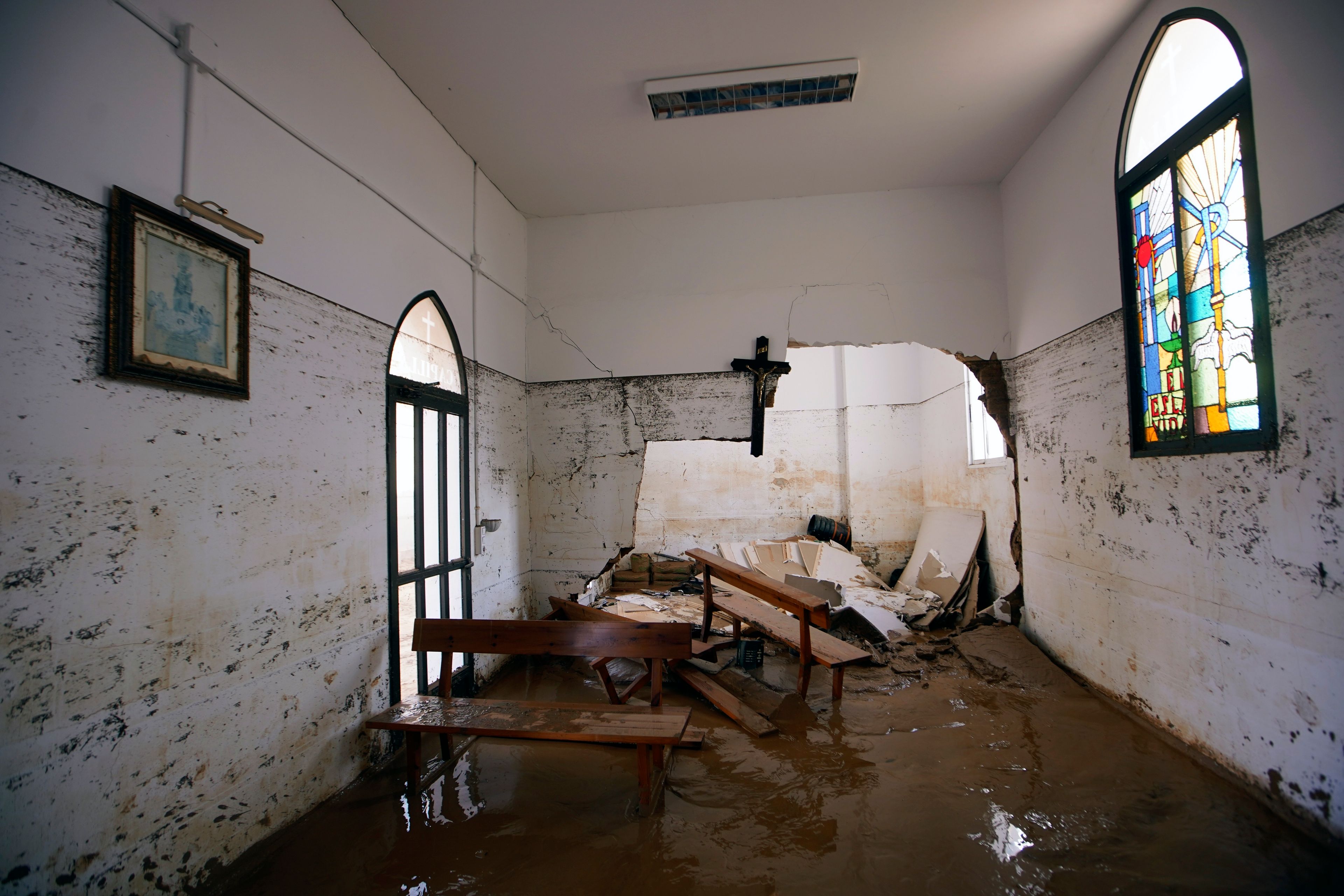 A chapel inside a flood damaged cemetery is seen after floods in Alfafar on the outskirts of Valencia, Spain, Wednesday, Nov. 6, 2024. (AP Photo/Alberto Saiz)