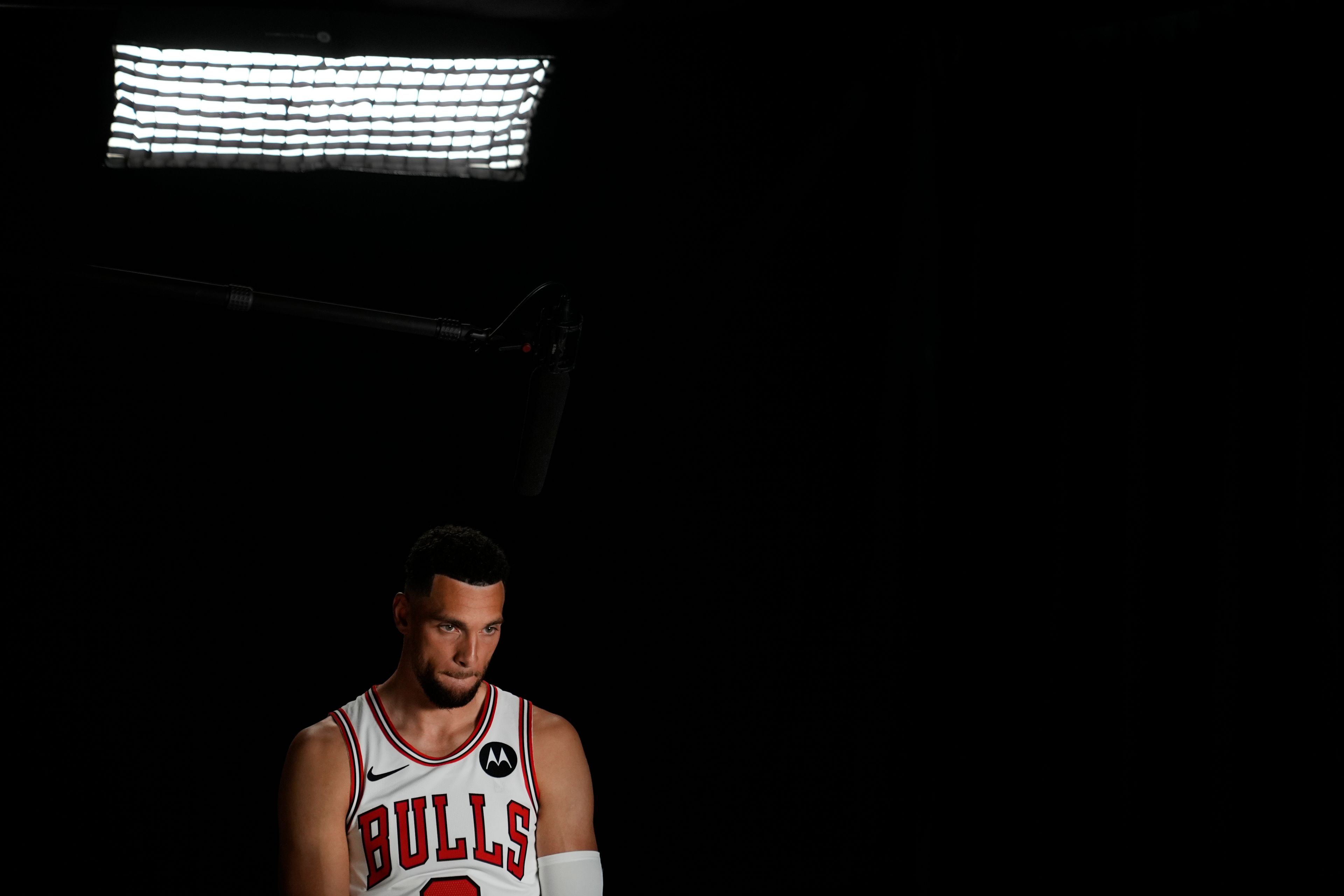 Chicago Bulls guard Zach LaVine sits for a television interview during the team's media day Monday, Sept. 30, 2024, in Chicago. (AP Photo/Charles Rex Arbogast)