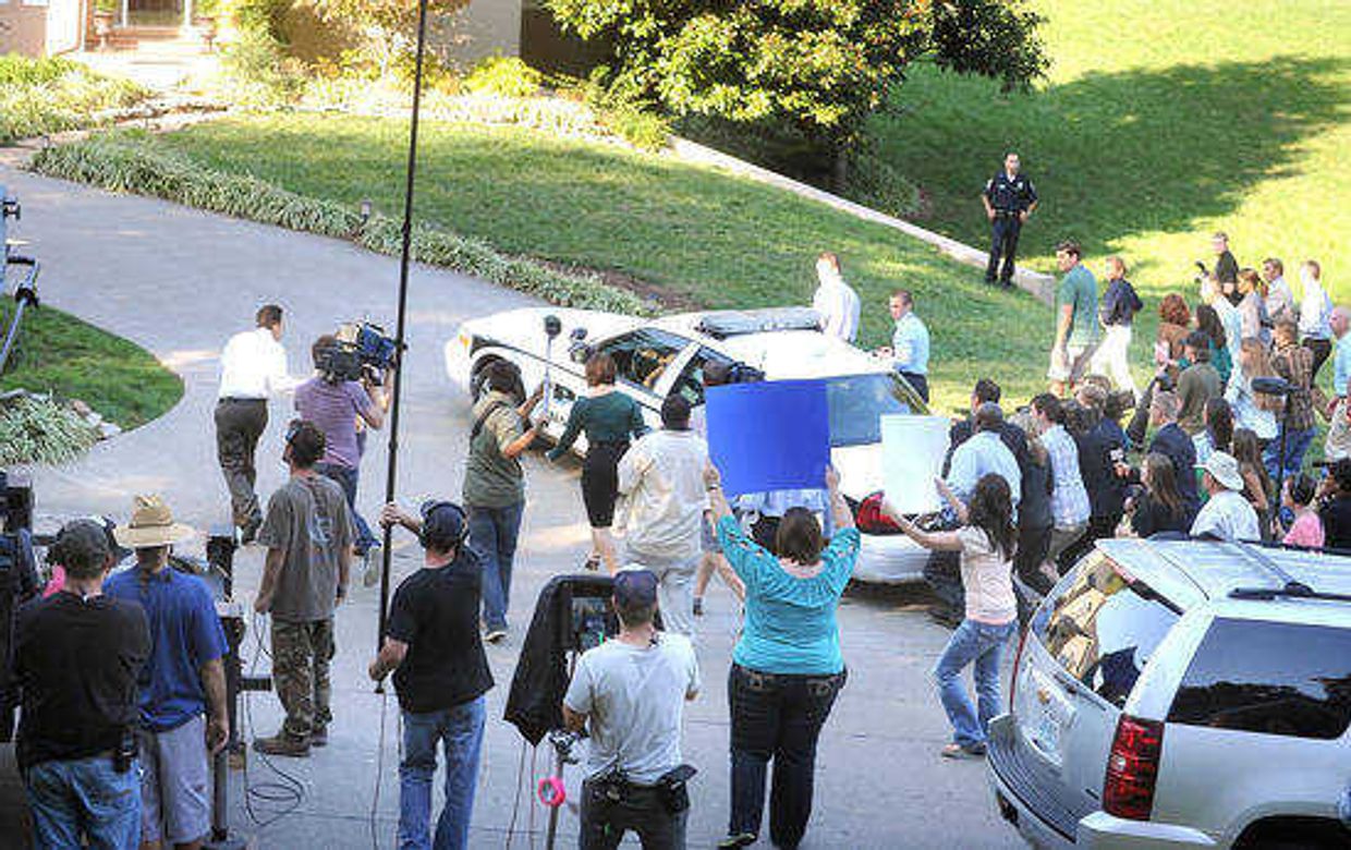 Extras participate in the filming of "Gone Girl" on Wednesday, Oct. 9, 2013, in Cape Girardeau. (Laura Simon)