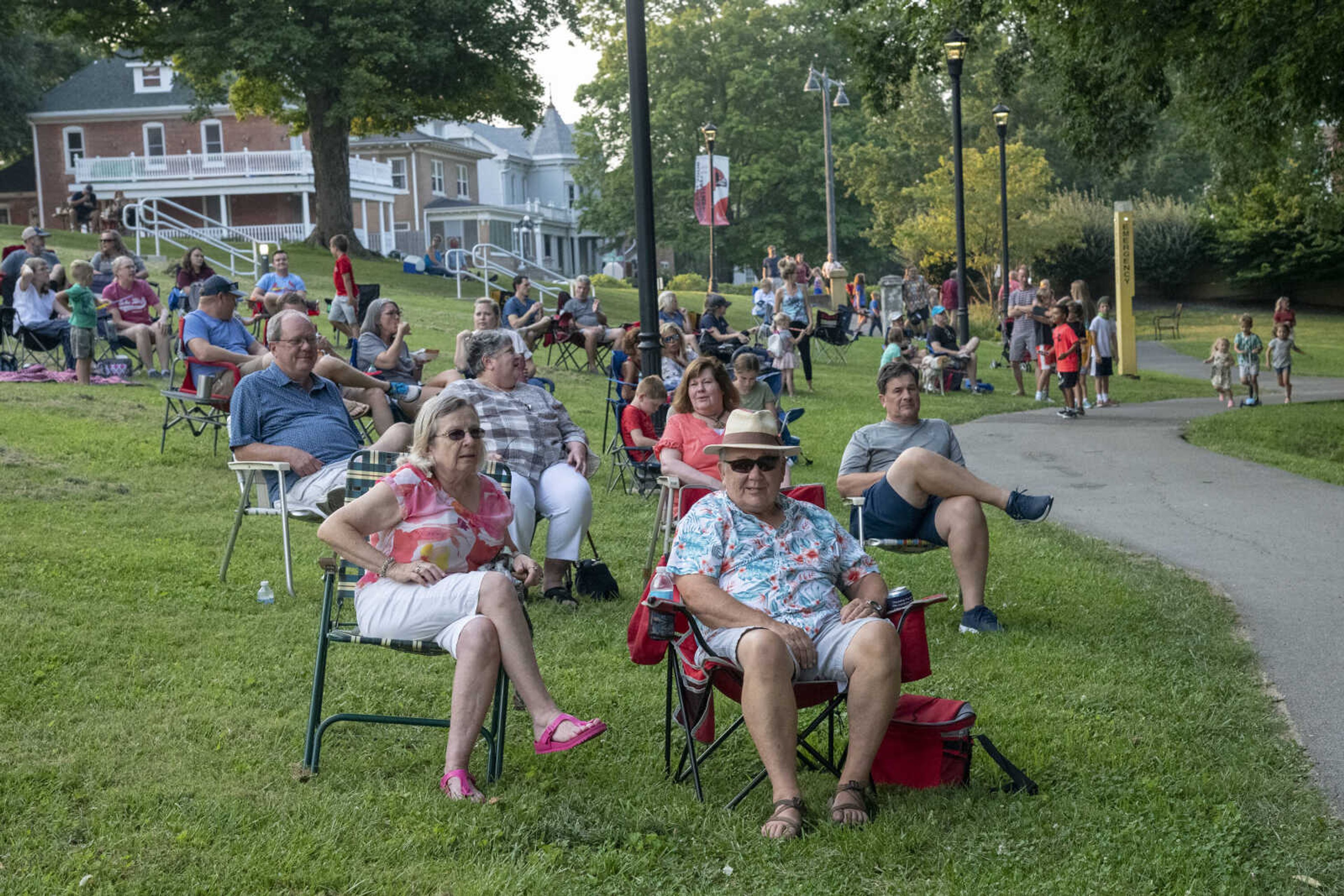 The audience watches as Anne McCue performs during Tunes at Twilight at the River Campus Friday Aug. 6, 2021.