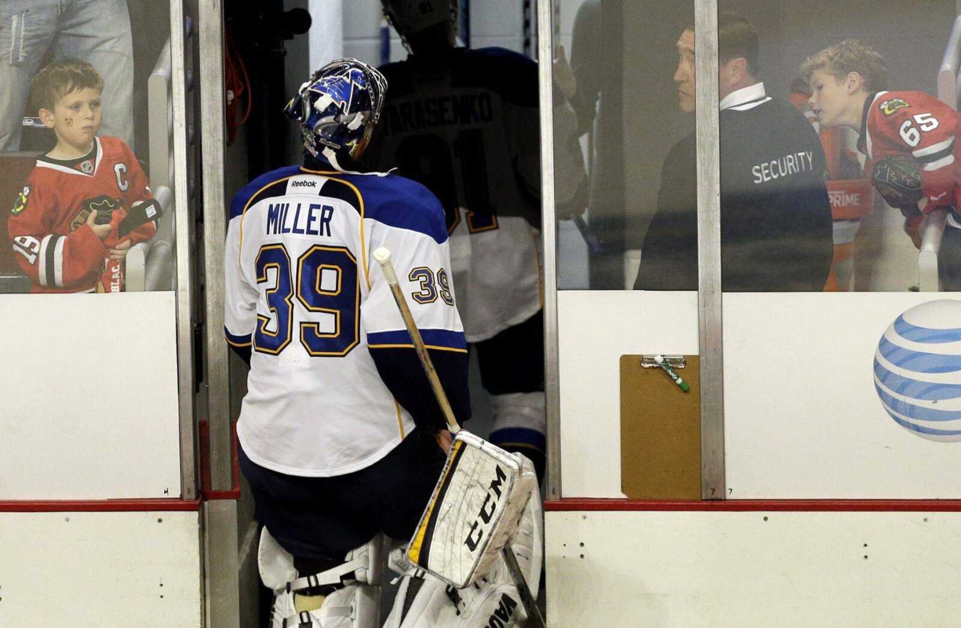 Blues goalie Ryan Miller leaves the ice after a 5-1 loss to the Blackhawks in Game 6 of their NHL first-round playoff series Sunday in Chicago.