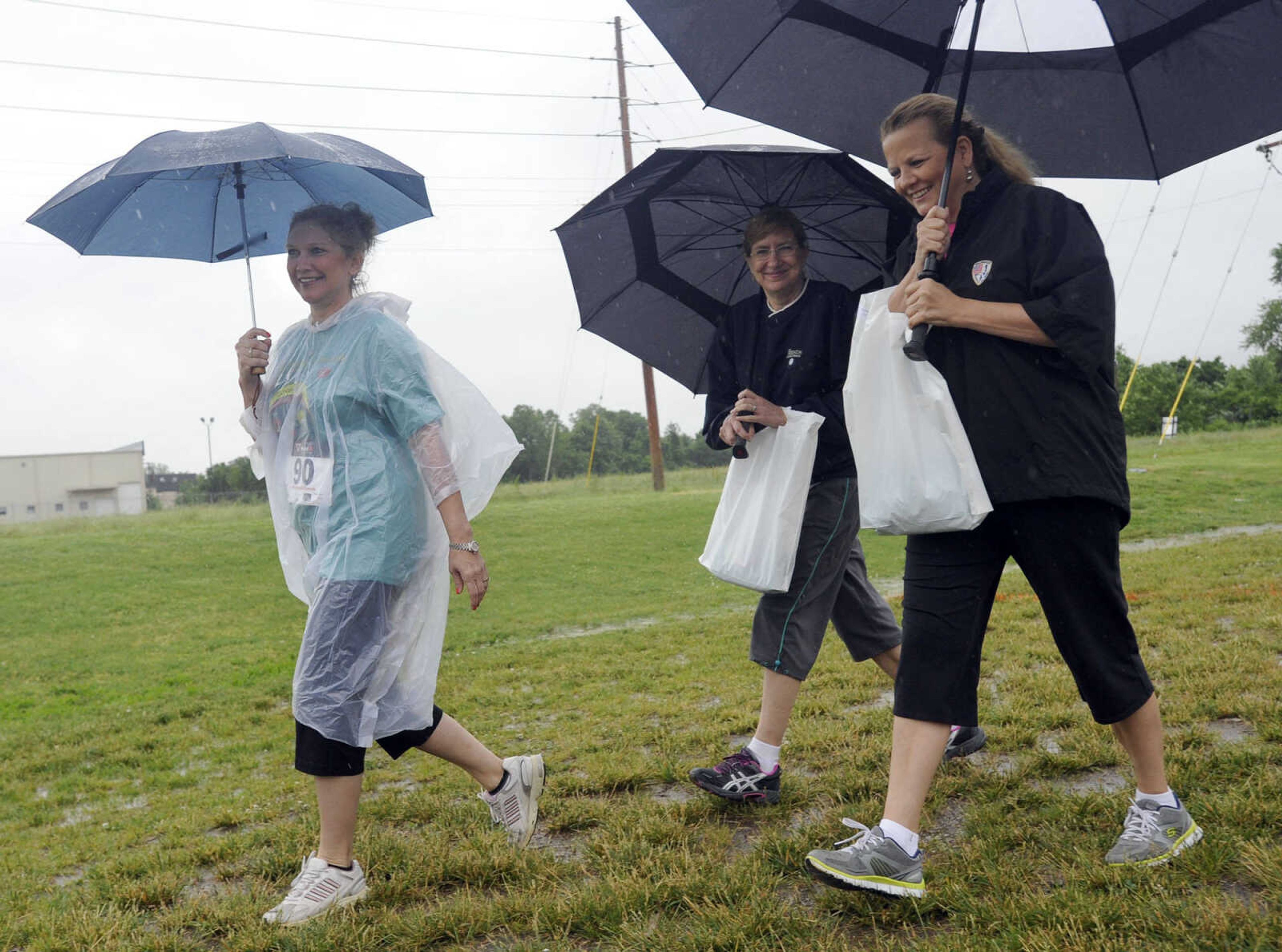 FRED LYNCH ~ flynch@semissourian.com
Walkers begin a 1-mile family wellness walk at the Jacque Waller 5K event Saturday, June 1, 2013 at Shawnee Park in Cape Girardeau.