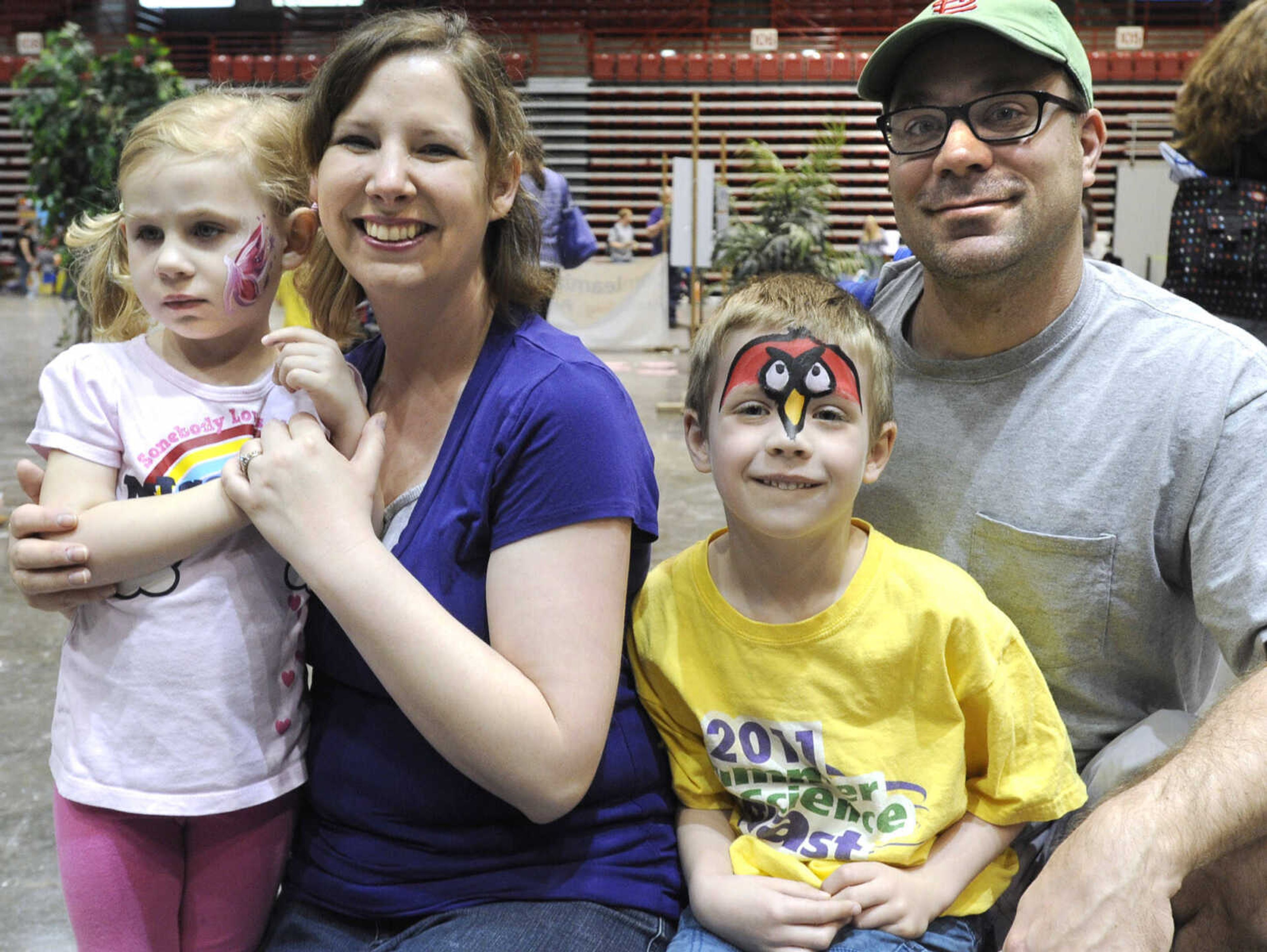 The Meyr family, Briley, left, Diane, Noah and Dwight, pose for a photo at the Messy Morning event Saturday, April 25, 2015 at the Show Me Center.