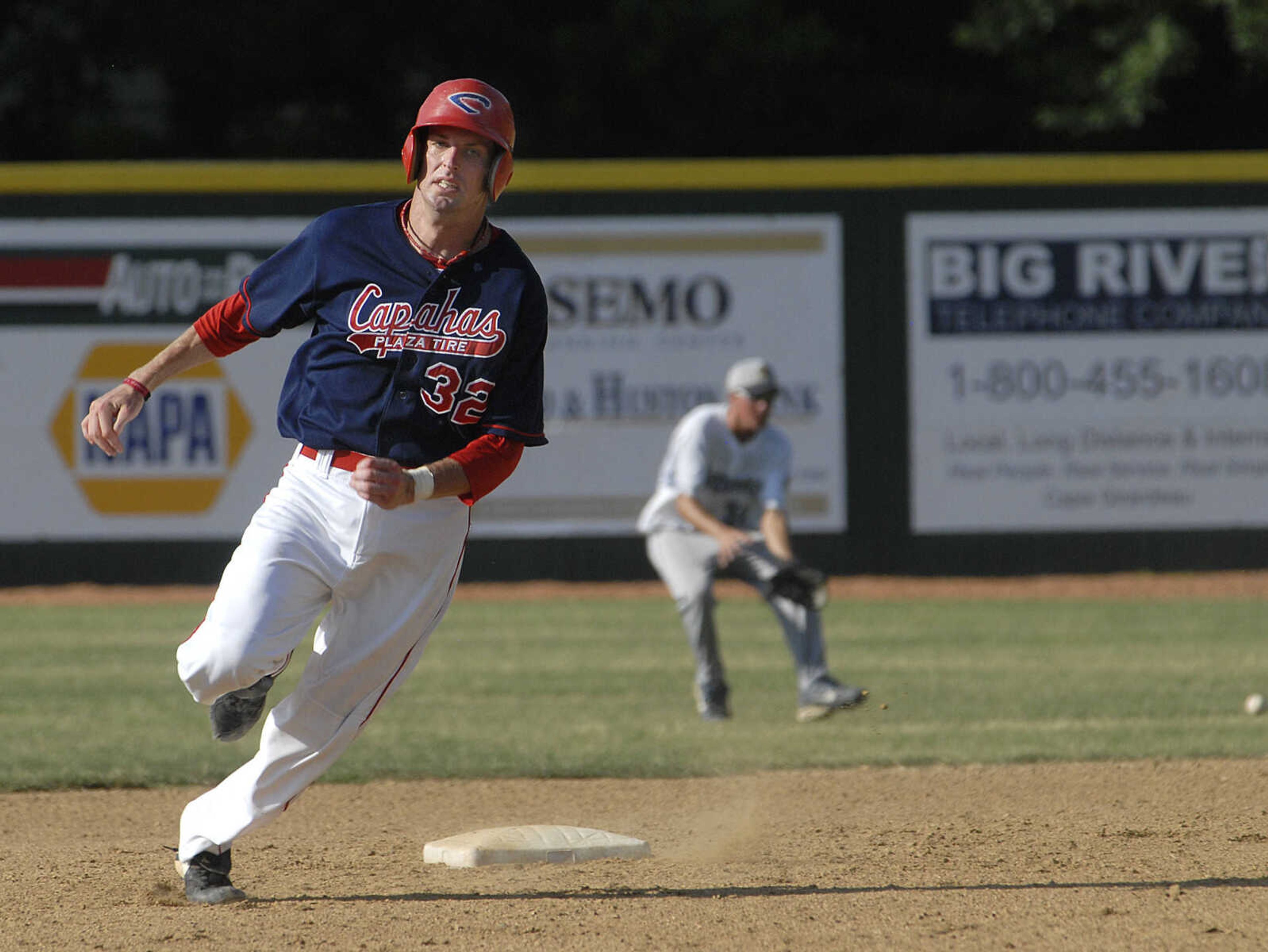 FRED LYNCH ~ flynch@semissourian.com
Capahas baserunner Denver Stuckey advances two bases toward third on a single by Jeremy Patton in the third inning of the first game against the Riverdogs Sunday at Capaha Field.