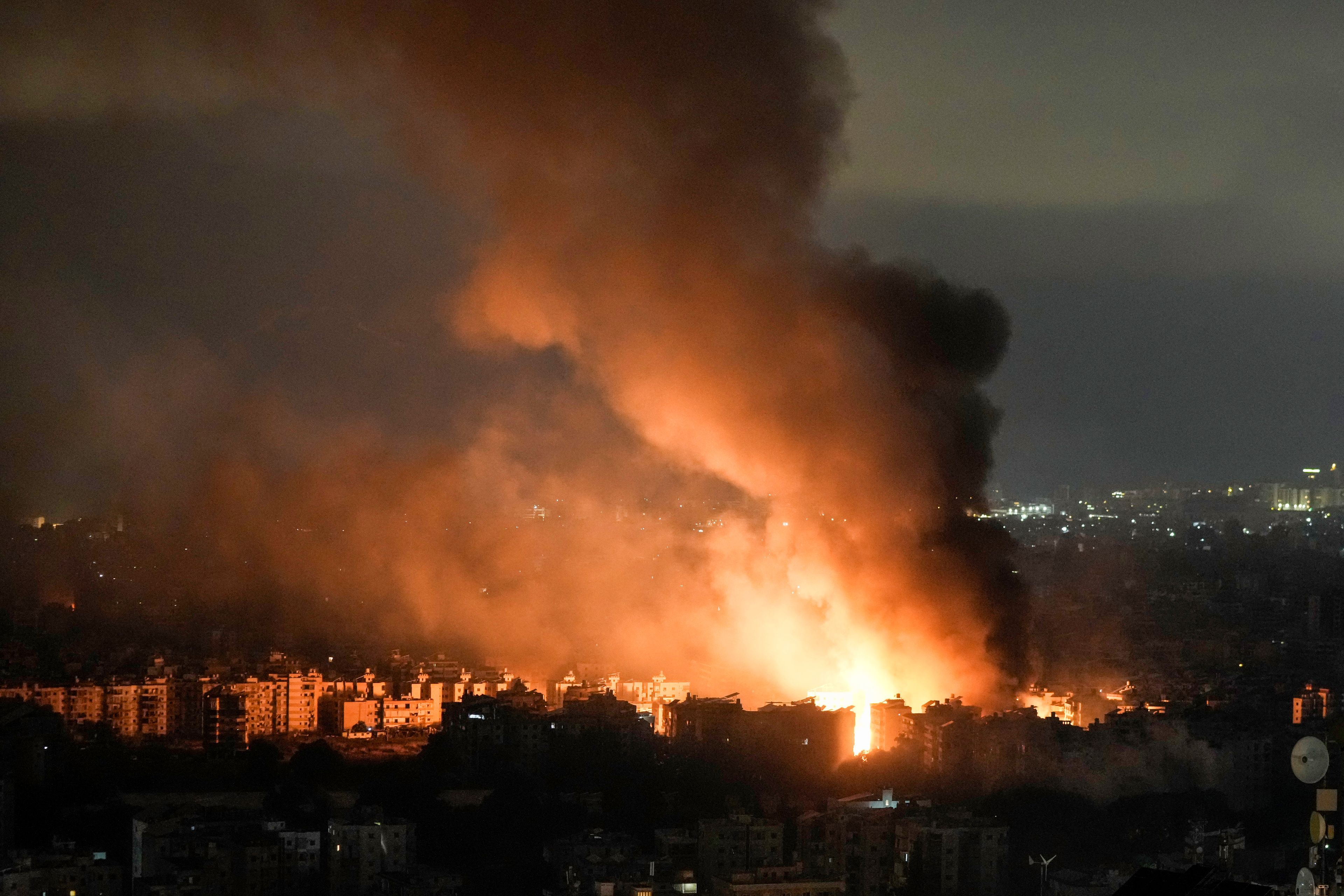 CORRECTS DATE TO MONDAY, OCT. 7, FROM SUNDAY, OCT. 6 - Flames and smoke rise from an Israeli airstrike in Dahiyeh, Beirut, Lebanon, Monday, Oct. 7, 2024. (AP Photo/Bilal Hussein)