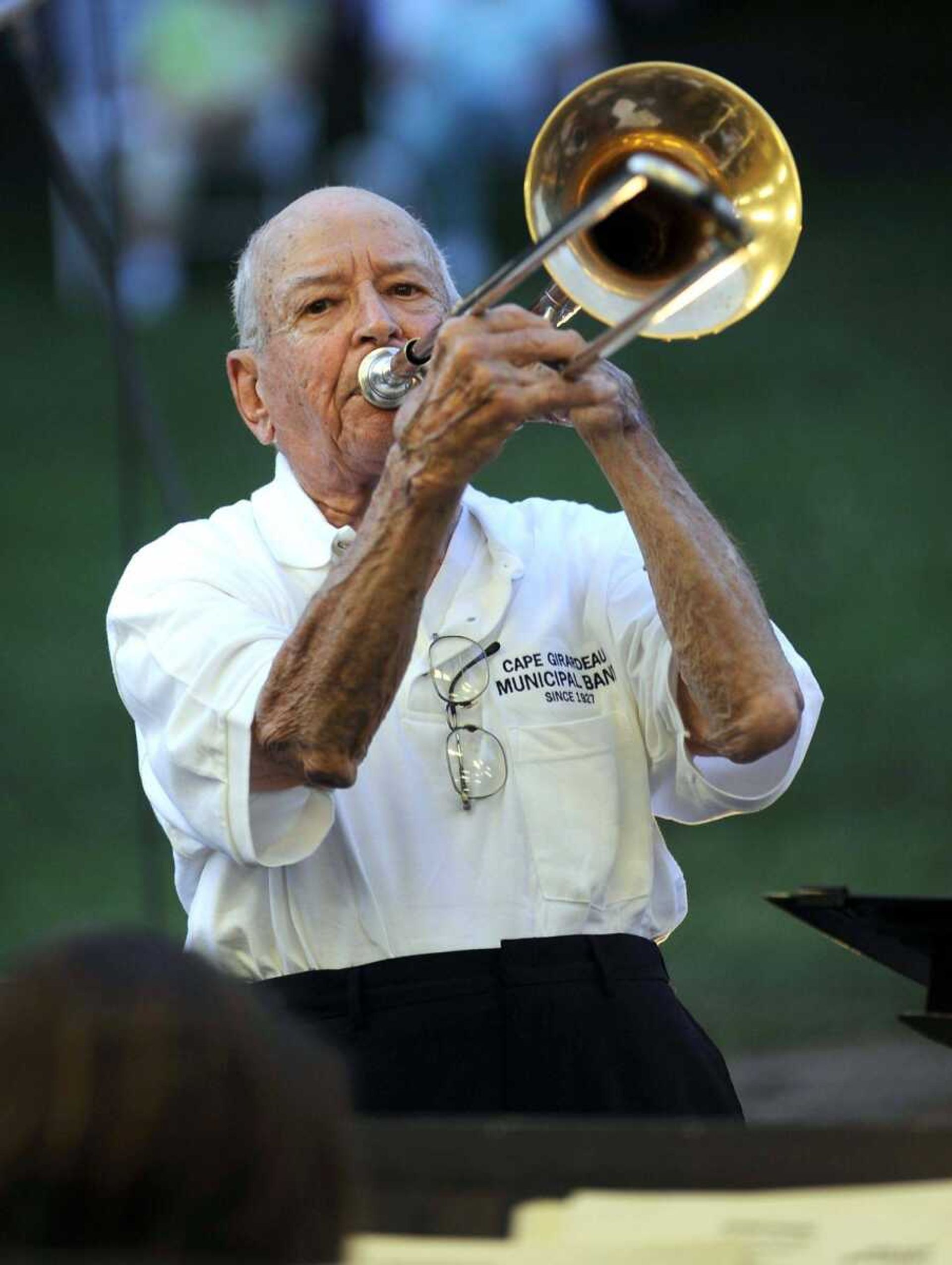 Dr. Dan Cotner directs the Cape Girardeau Municipal Band in Henry Fillmore's "His Honor" on June 18 at the Capaha Park bandshell. (Fred Lynch)