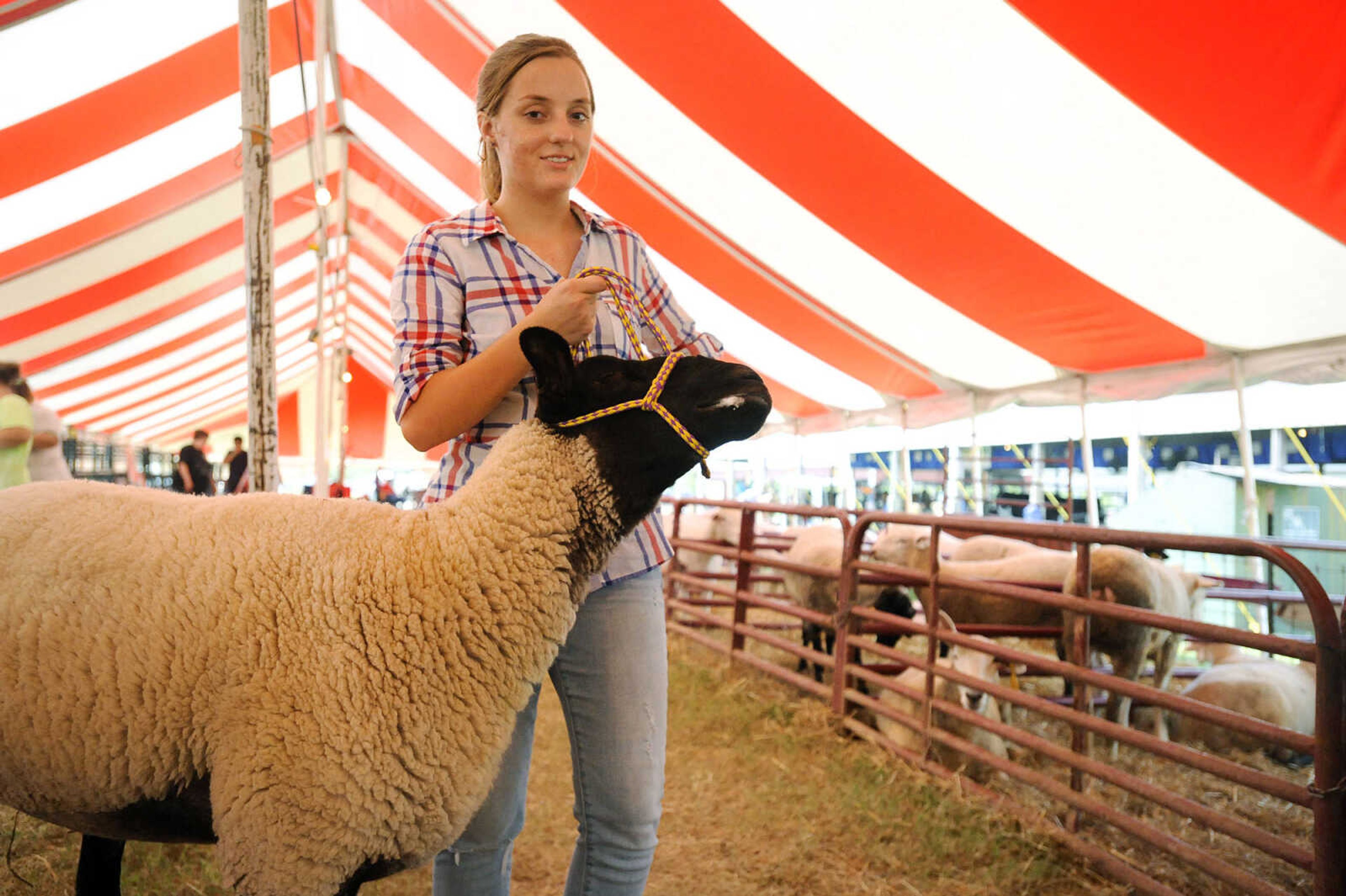 LAURA SIMON ~ lsimon@semissourian.com

Jera Kranawetter waits with her sheep on Wednesday, Sept. 14, 2016, during the sheep judging at the SEMO District Fair at Arena Park in Cape Girardeau.