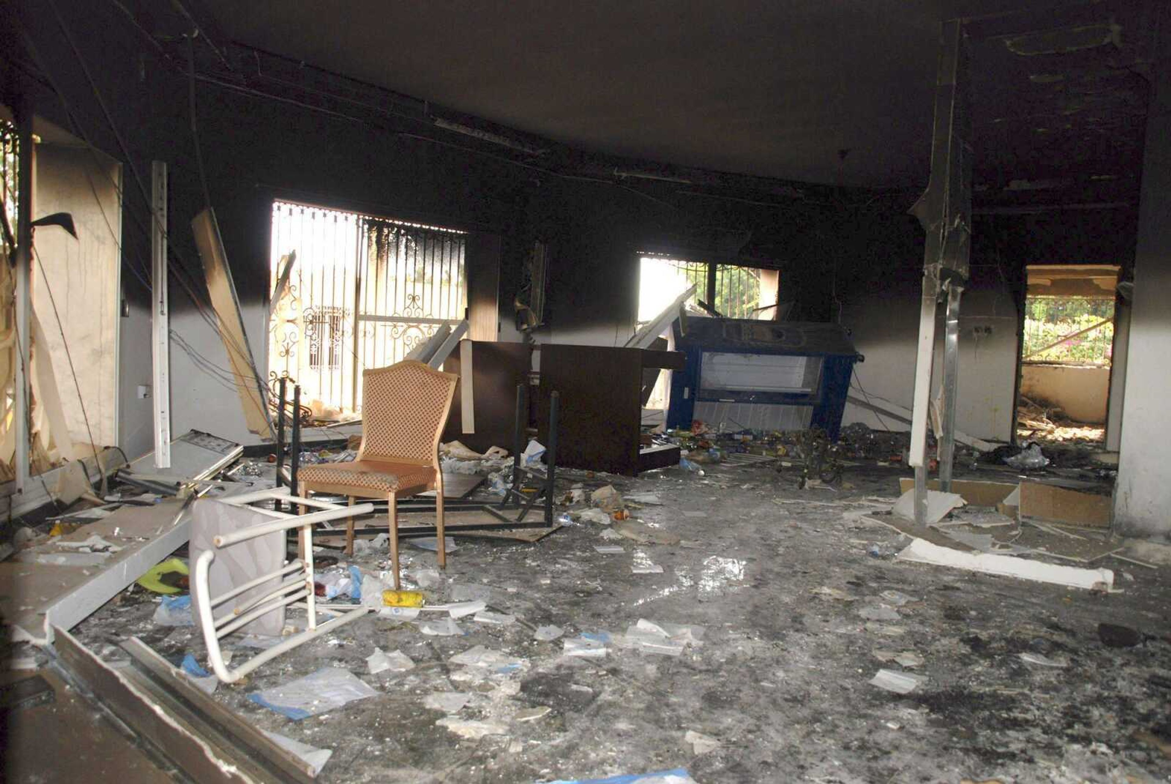 Glass, debris and overturned furniture are strewn inside a room in the gutted U.S. consulate Wednesday in Benghazi, Libya, after an attack that killed four Americans, including ambassador Chris Stevens. (Ibrahim Alaguri ~ Associated Press)