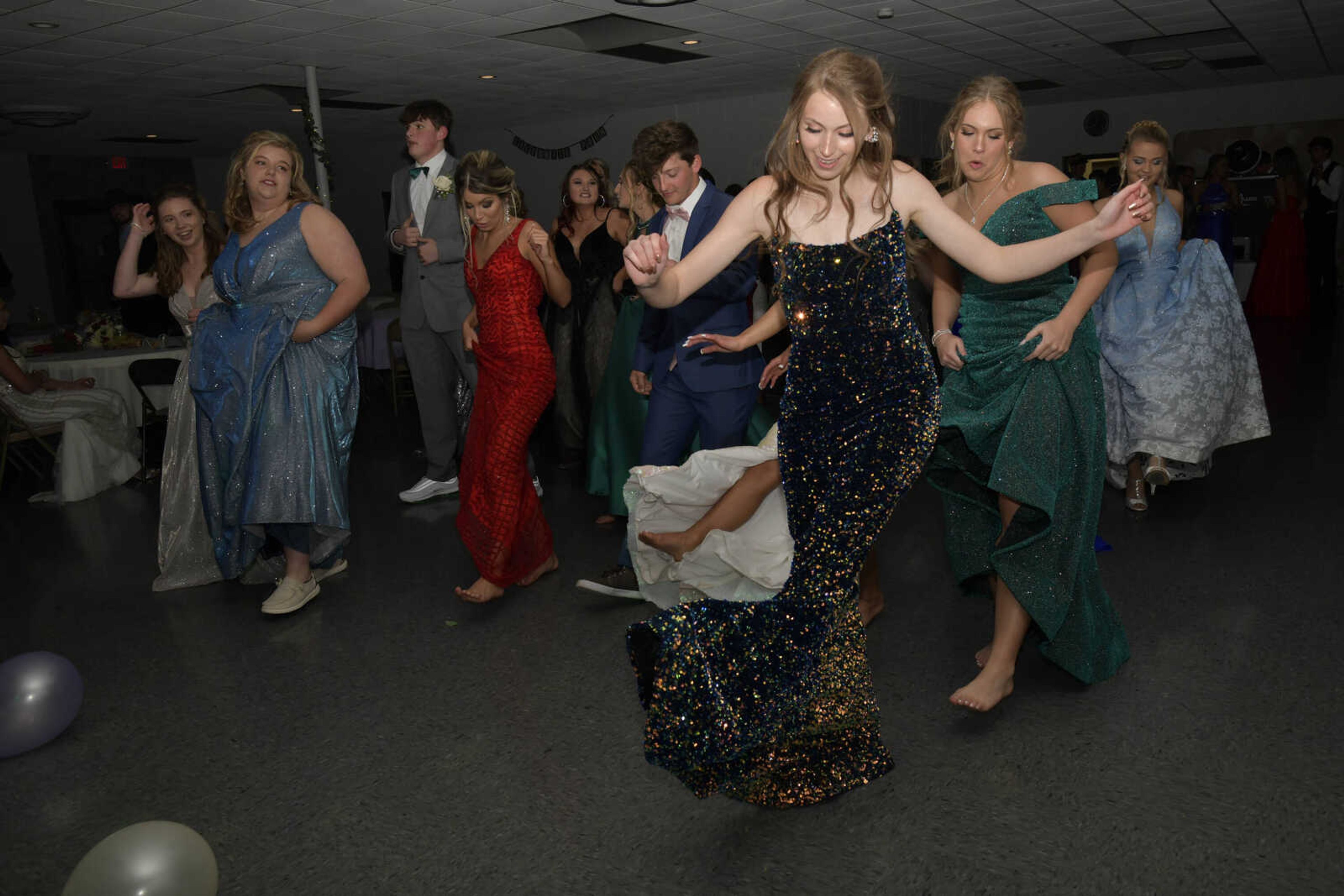 Students dance to the "Cupid Shuffle" during prom at the Front Porch in Scott City on Saturday, April 24, 2021.