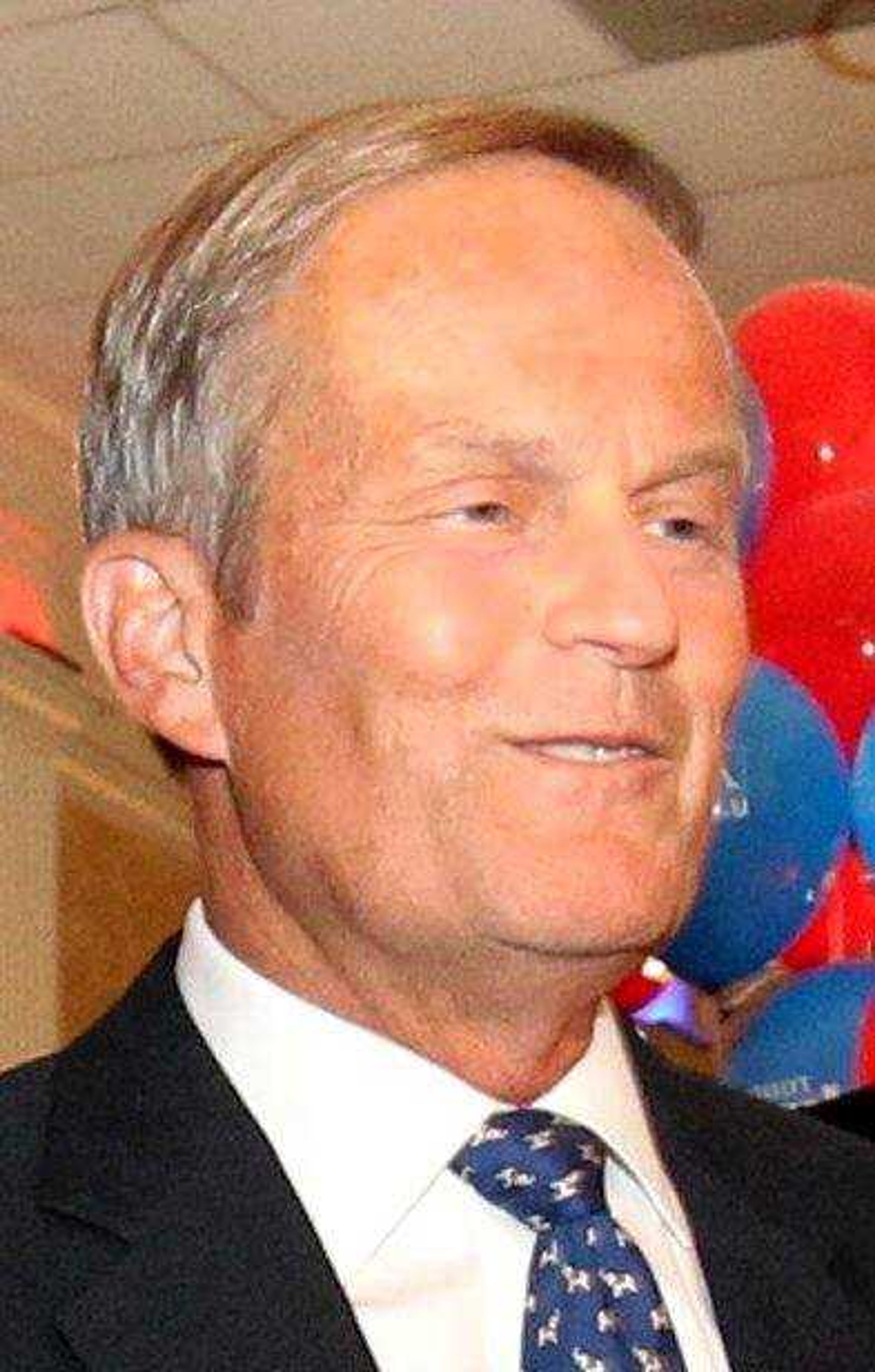 Republican U.S. Senate candidate Todd Akin emerges to give his victory speech after his win in the senate primary race at his campaign party at the Columns Banquet Center in St. Charles, Mo., on Tuesday, Aug. 7, 2012. (AP Photo/St. Louis Post-Dispatch, Christian Gooden)