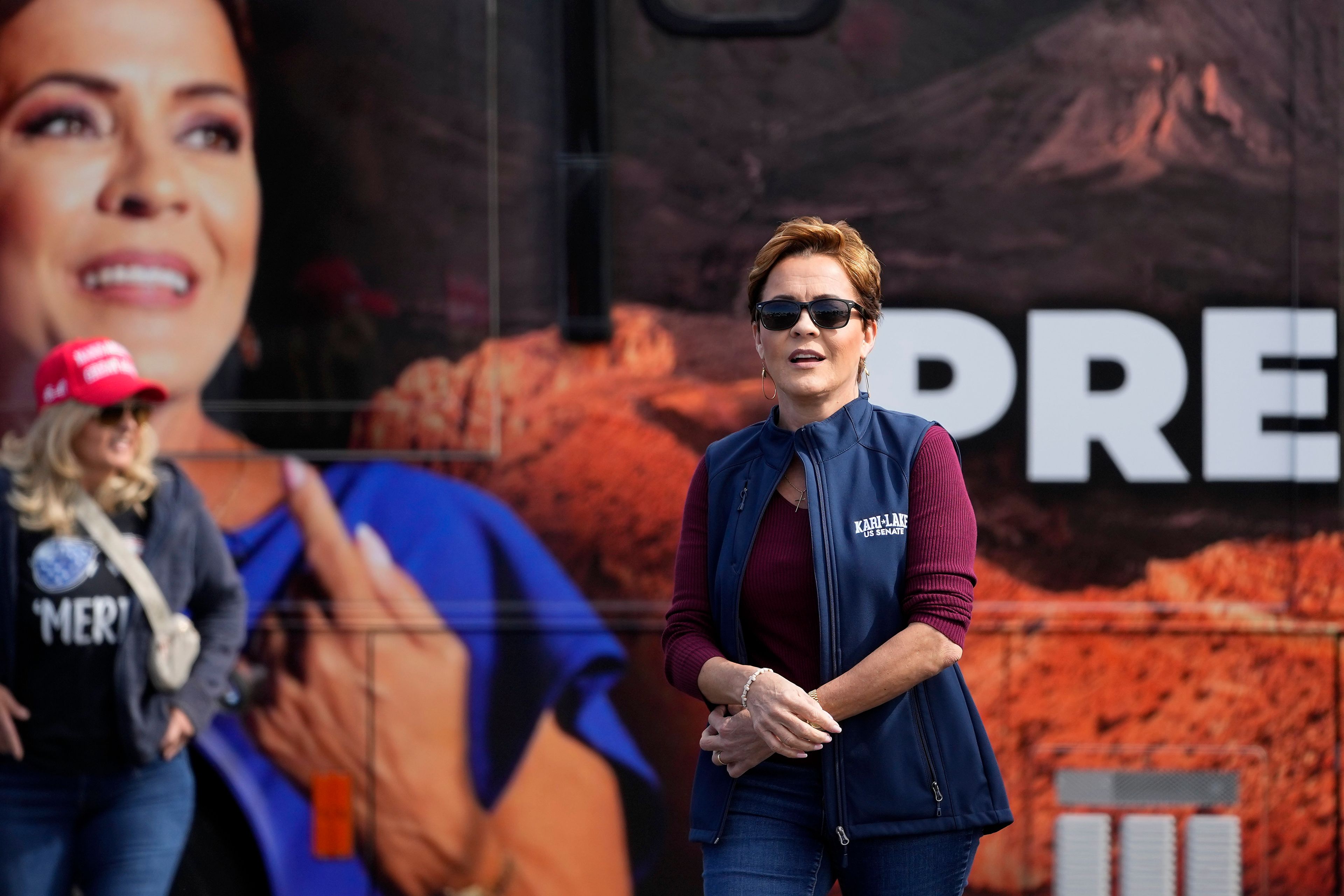 Republican candidate for U.S. Senate Kari Lake arrives to vote, Tuesday, Nov. 5, 2024, in Phoenix, Ariz. (AP Photo/Matt York)