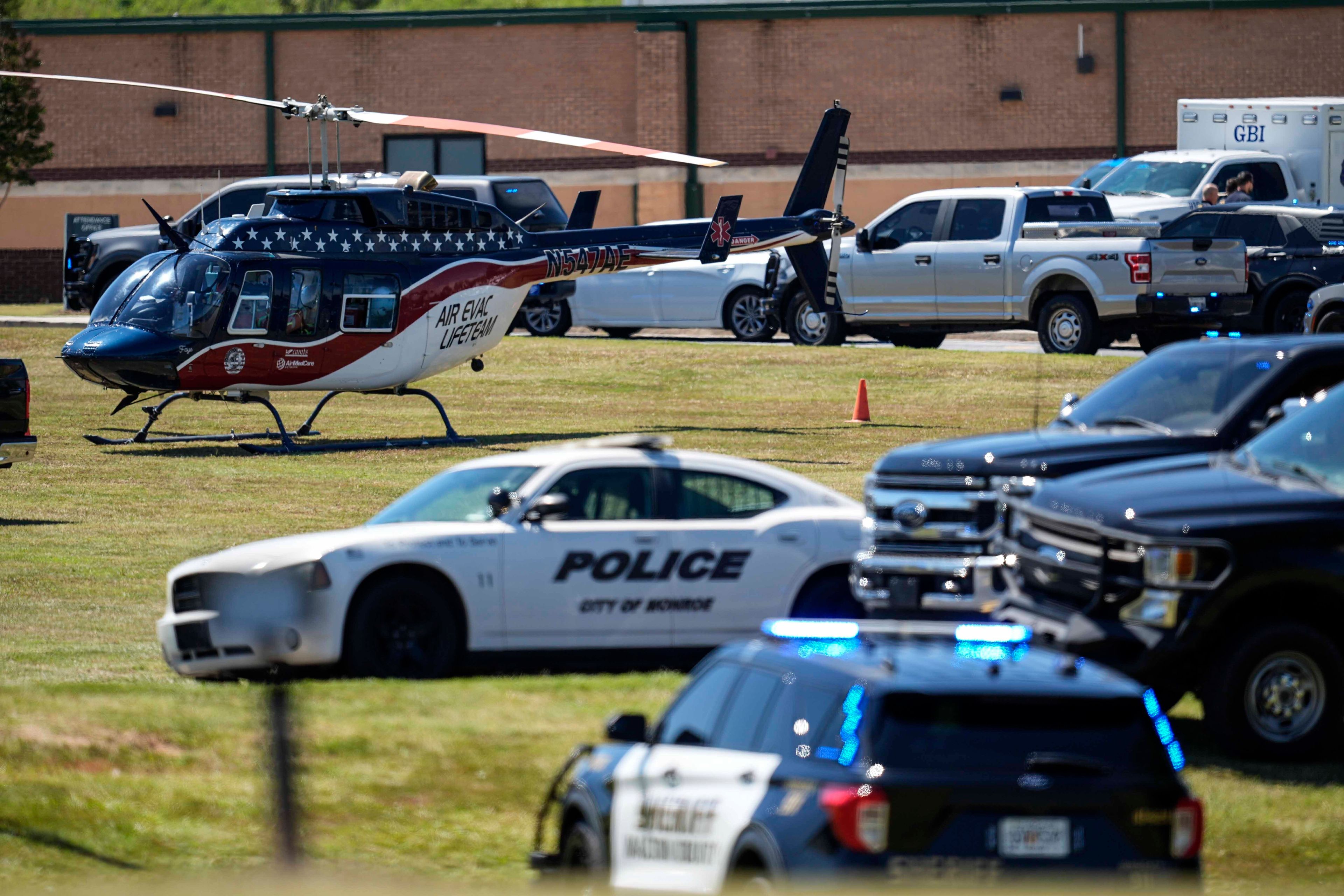 A medical helicopter is seen in front of Apalachee High School after a shooting at the school Wednesday, Sept. 4, 2024, in Winder, Ga. (AP Photo/Mike Stewart)