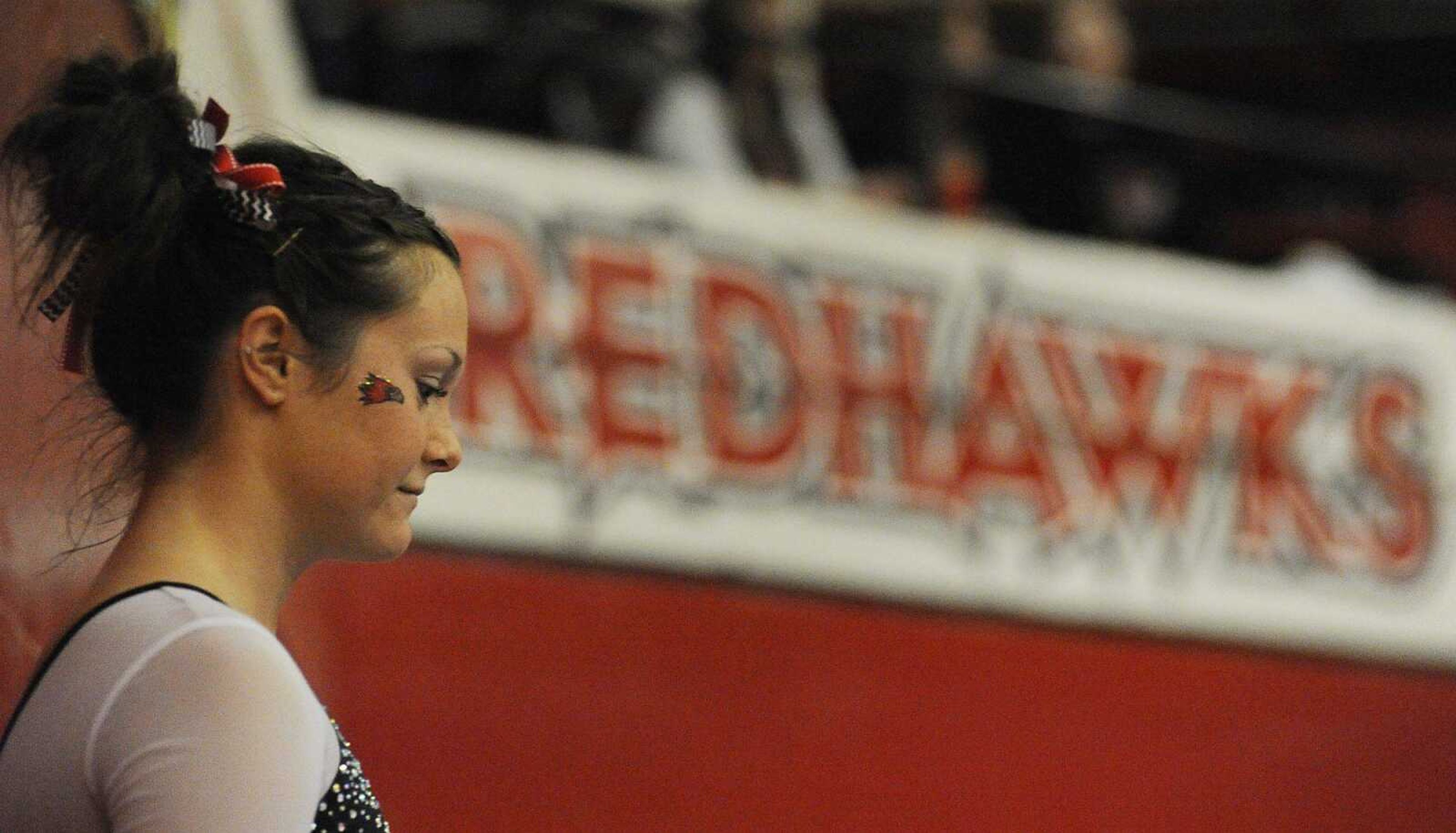 Southeast Missouri State's Taryn Vanderpool prepares to compete in the uneven bars during the Redhawks' 194.225-193.875 win over Texas Woman's University Pioneers Friday, March 8, at the Houck Field House. (ADAM VOGLER)