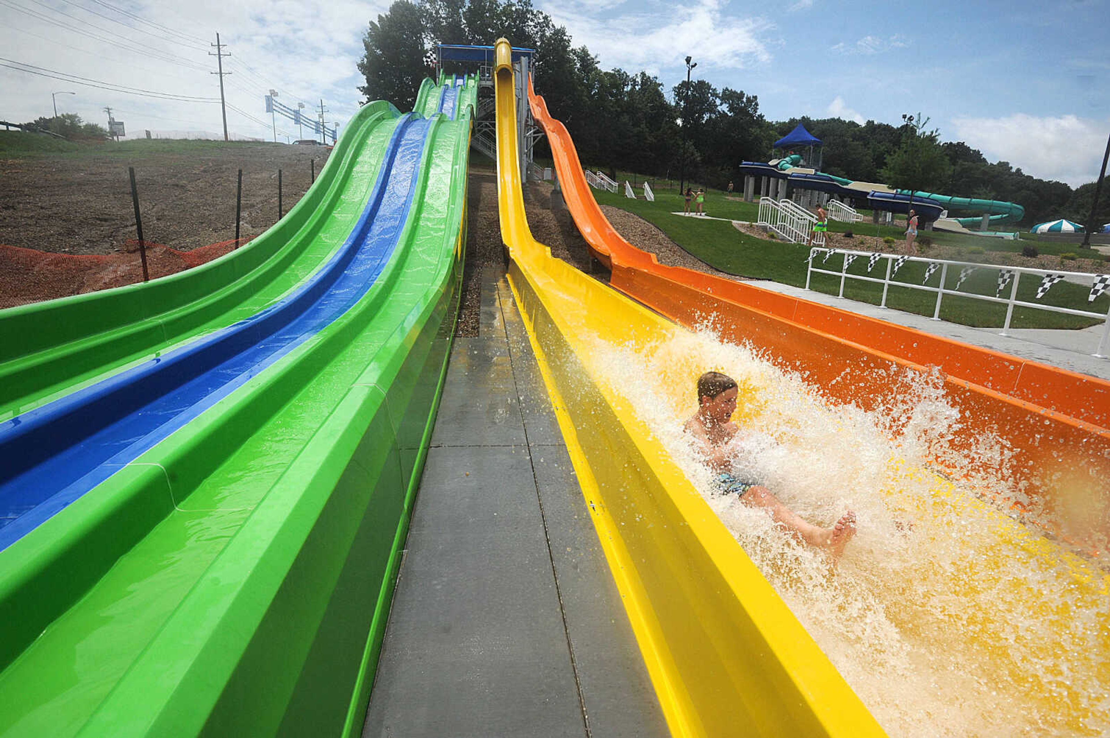 LAURA SIMON ~ lsimon@semissourian.com

The Cape Girardeau Parks and Recreation Department opened the new 265-foot-long free-fall slide, 259-foot-long triple-drop slide and a three-Lane 319-foot-long mat racer with 30-foot tower, at Cape Splash Family Aquatic Center, Thursday, July 9, 2015.