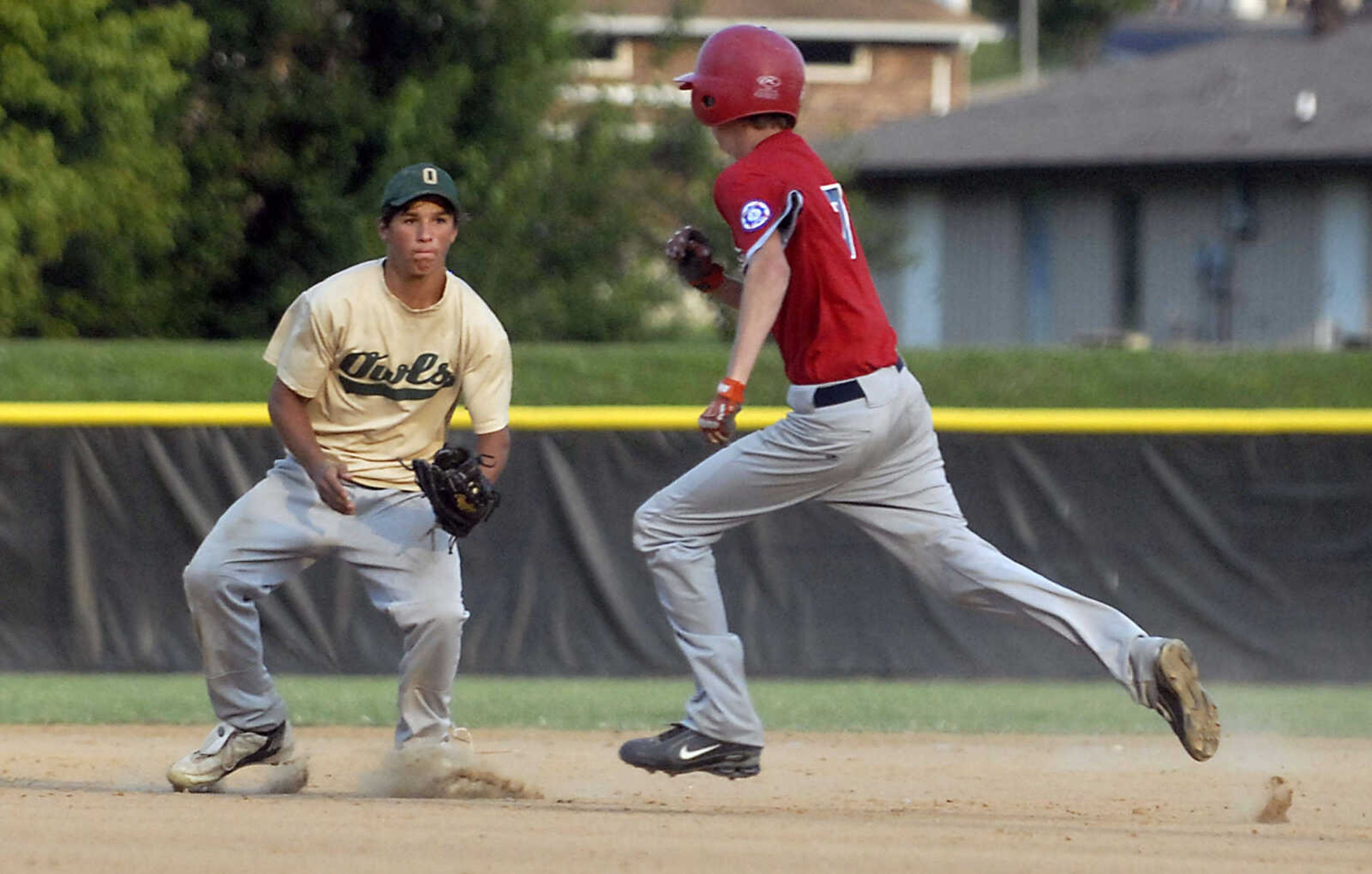 KIT DOYLE ~ kdoyle@semissourian.com
New Madrid second baseman Kyle Harris tags out Jackson runner B.I. Howard Monday evening, July 6, 2009, in a Senior Babe Ruth game at Jackson City Park.