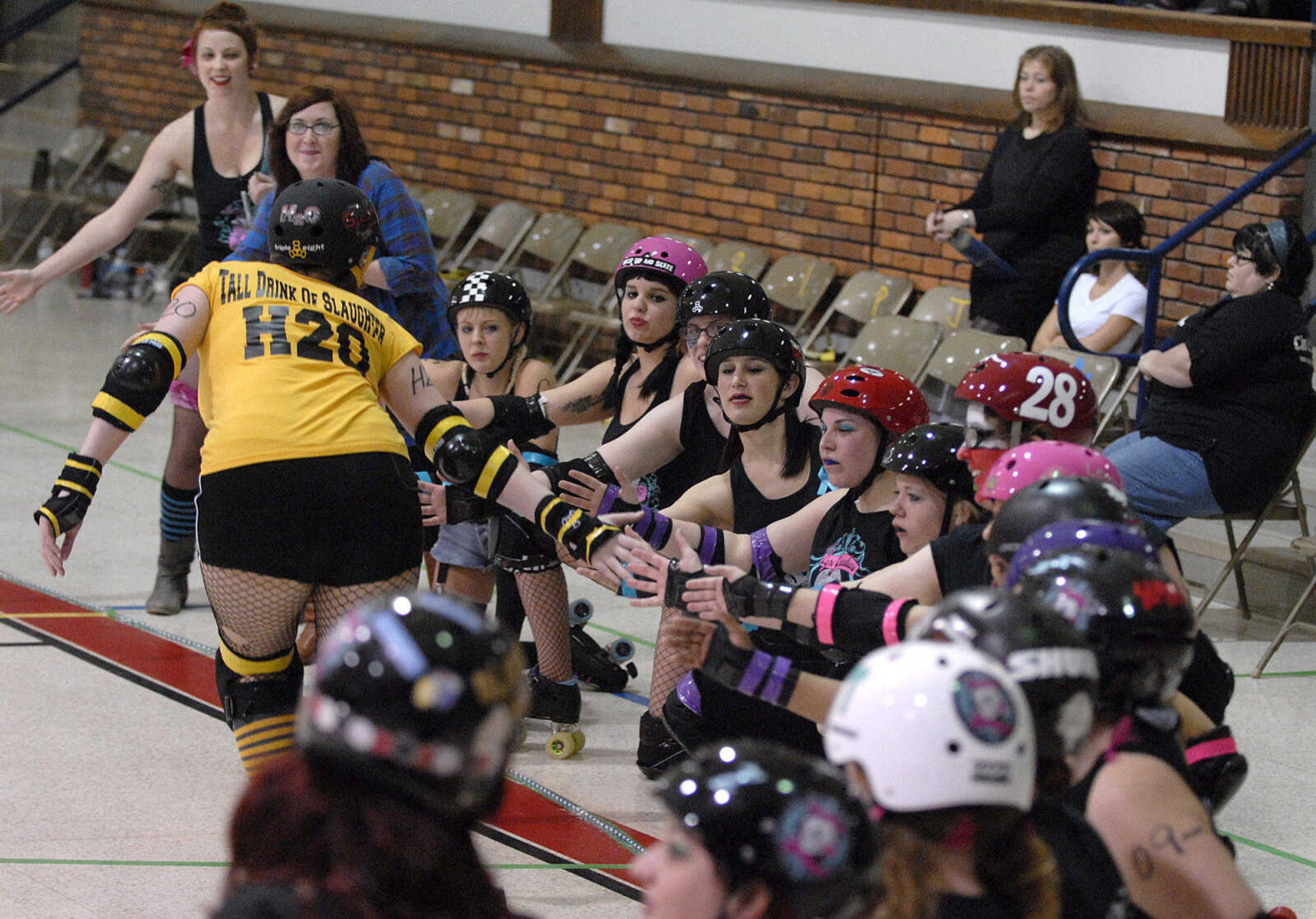 LAURA SIMON~lsimon@semissourian.com
The Cape Girardeau Roller Girls take on the Southern Illinois Roller Girls Saturday, February 26, 2011 during  Riot at the CG Corral at the A.C. Brase Arena Building in Cape Girardeau.