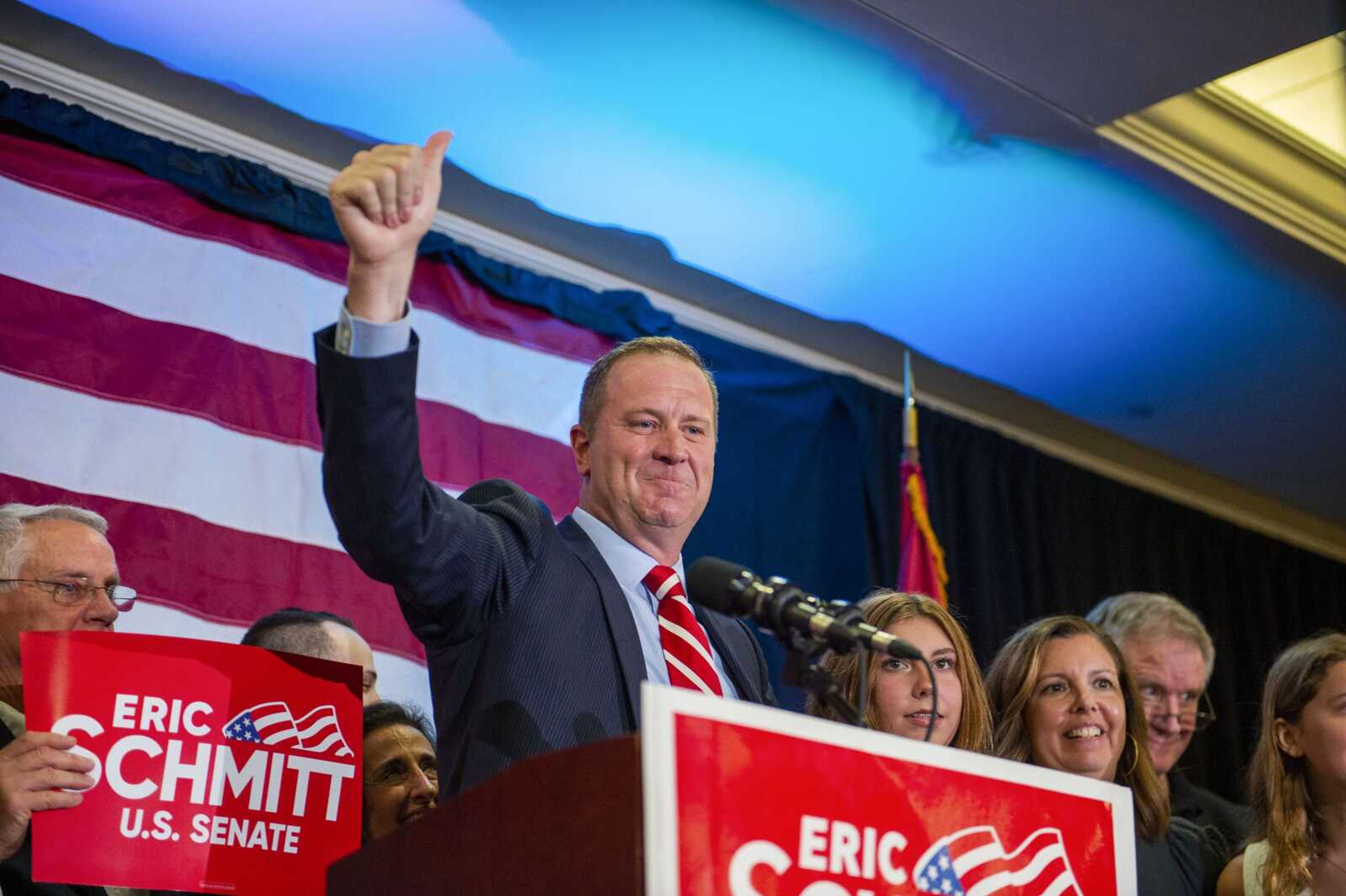 Missouri Attorney General Eric Schmitt acknowledges the crowd of supporters at his election night watch party Tuesday in St. Louis after winning the GOP primary for U.S. Senate. Schmitt be facing two opponents with deep pockets in November -- Democrat and Anheuser-Busch beer heiress Trudy Busch Valentine, and independent John Wood. Wood is a Republican who has the financial backing of a PAC led by former Republican Sen. John Danforth.