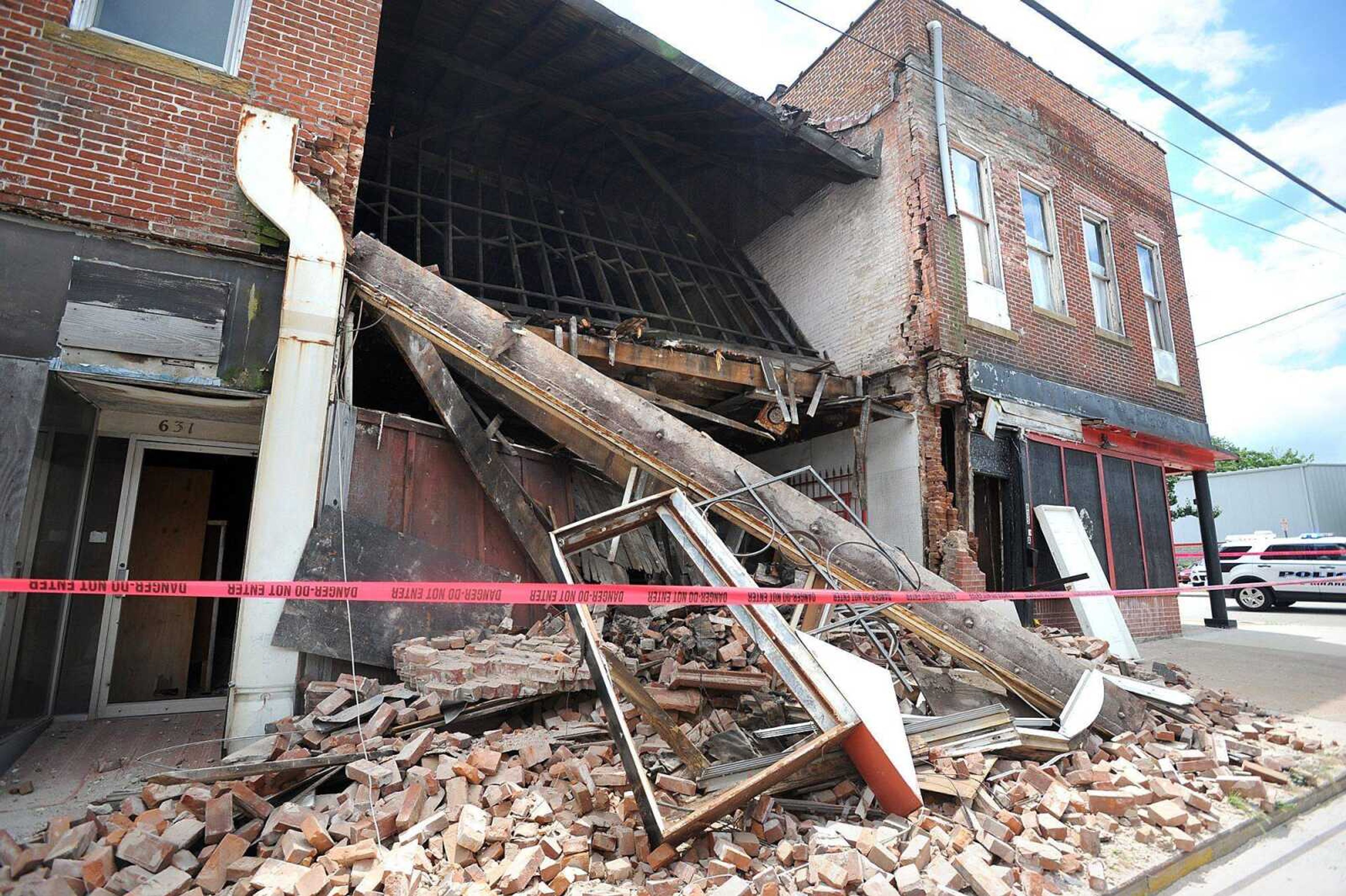 A building on the 600 block of Good Hope Street collapsed Thursday afternoon, July 3, 2014, in Cape Girardeau. (Laura Simon)