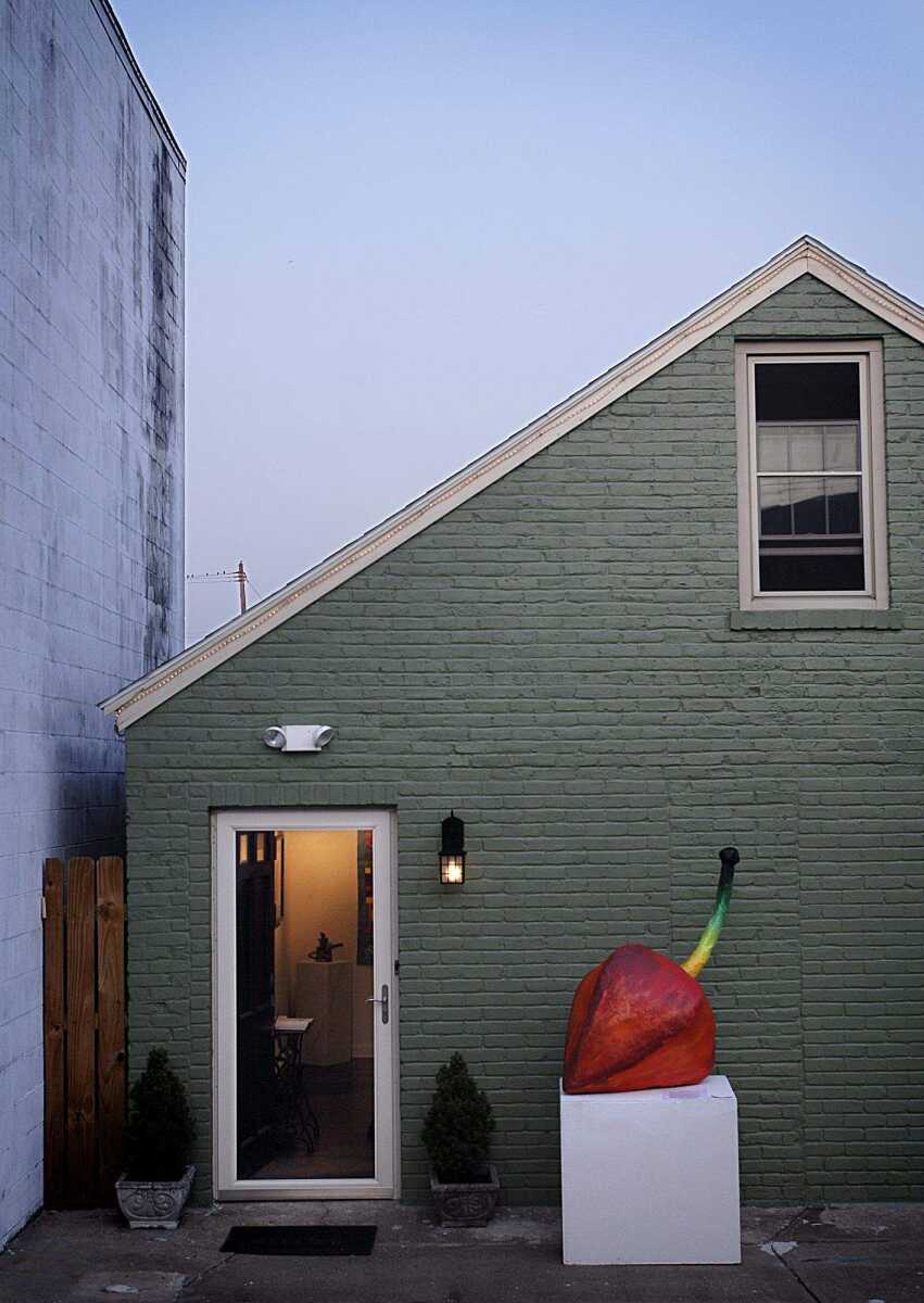 AARON EISENHAUER ~ aeisenhauer@semissourian.com
"Chinese Lantern Seed Pod", a paper mache work by Heather Themm sets outside the Black Door Gallery.