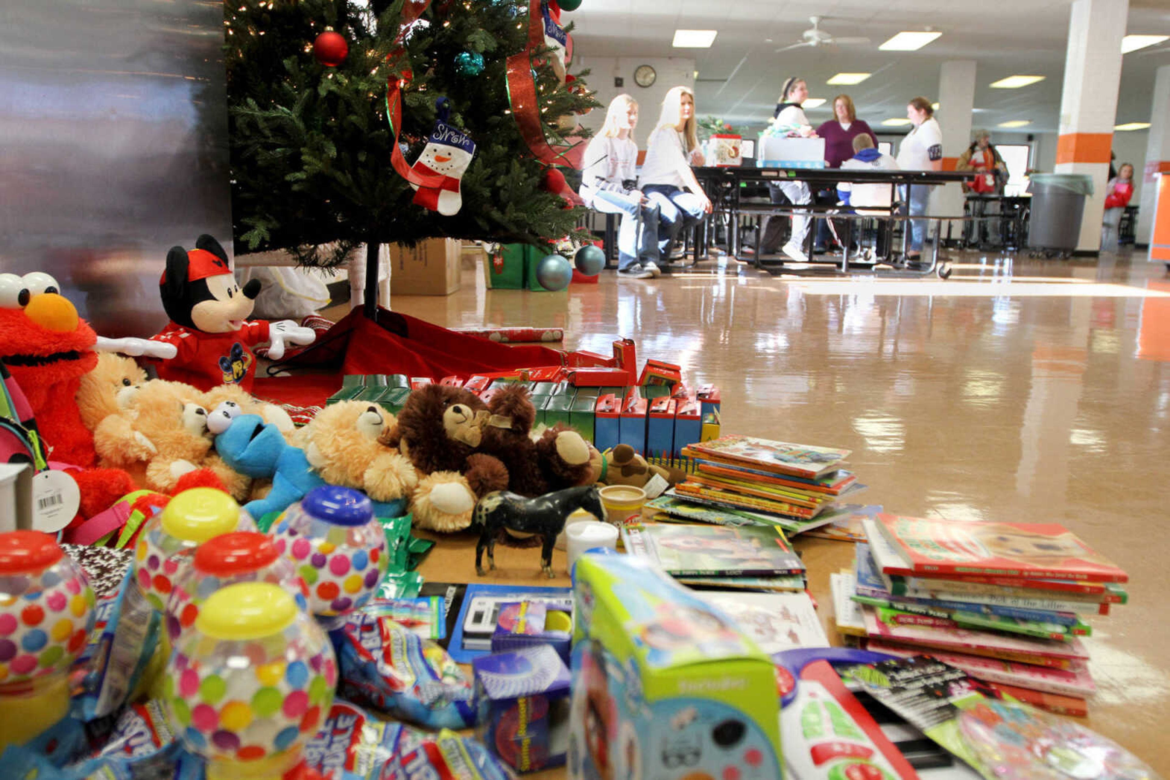 GLENN LANDBERG ~ glandberg@semissourian.com

Toys wait to be handed out during the Student Santas Christmas dinner Thursday, Dec. 25, 2014 at Central Junior High School.