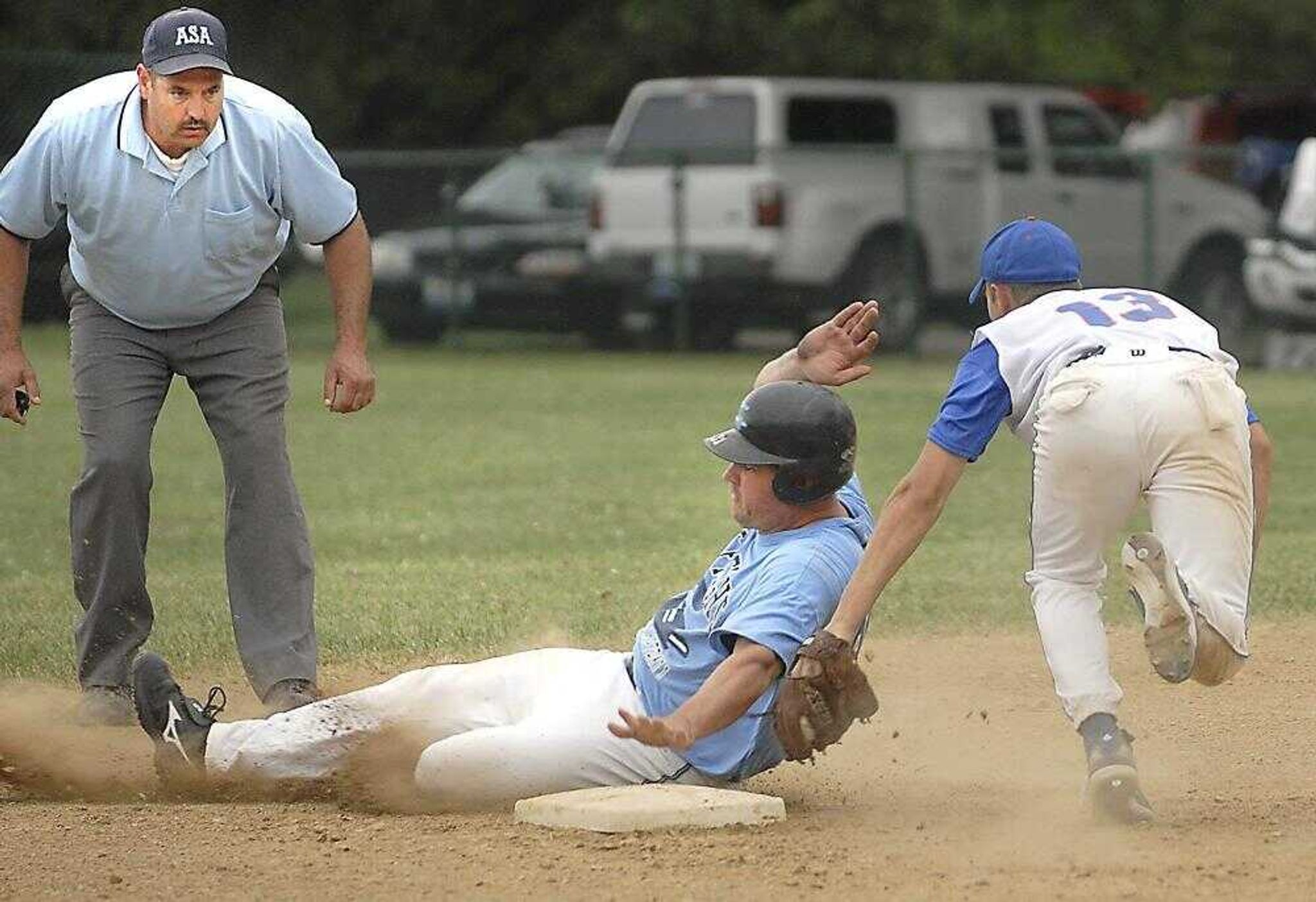 Bloomington's shortstop Jason Lee tagged out Vandalia's Nick Casey at second base Sunday during the fourth inning of their first game in the championship round of the Kelso Klassic. (Fred Lynch)