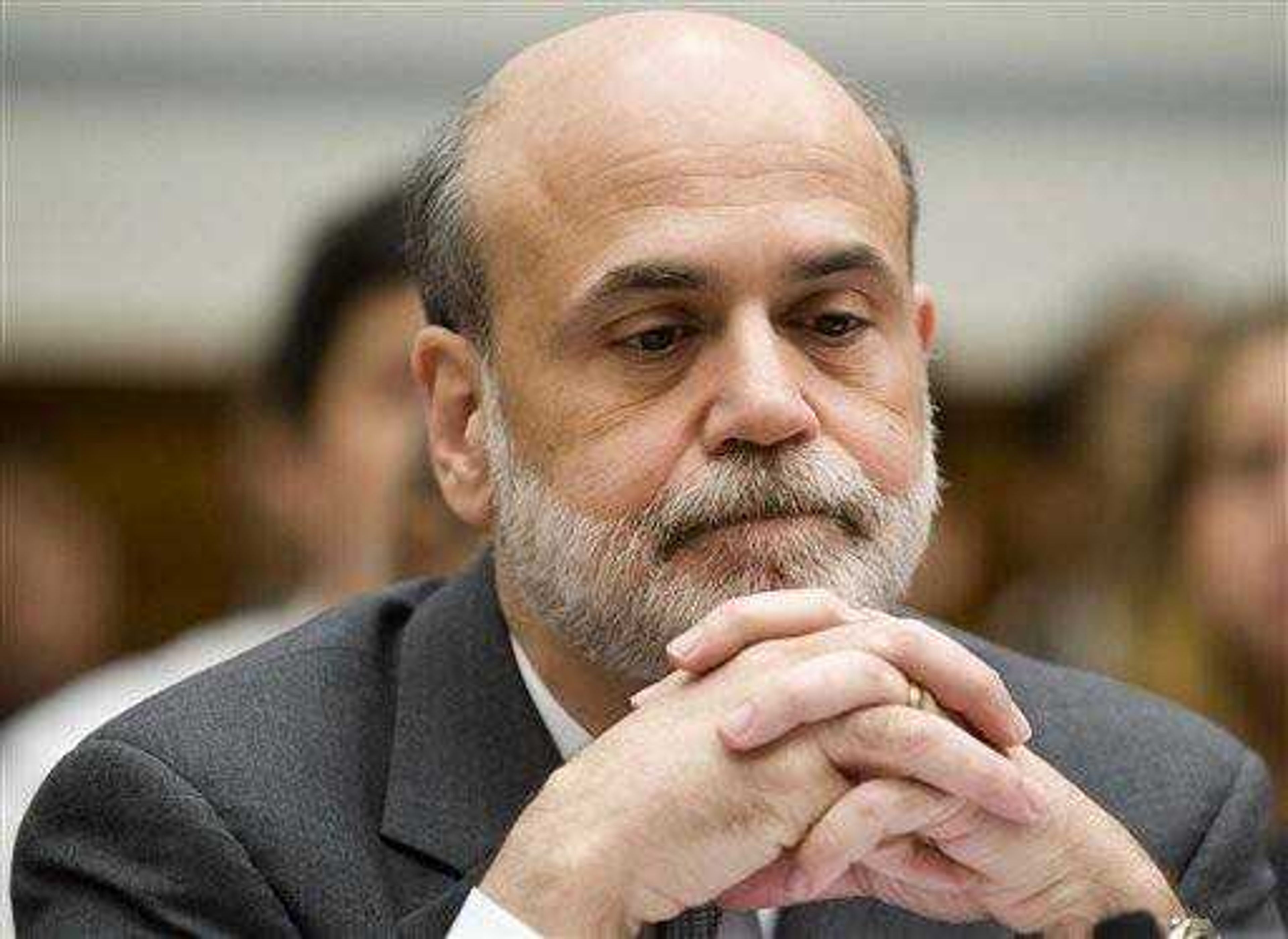 Federal Reserve Chairman Ben Bernanke testifies on Capitol Hill in Washington June 25 before House Oversight and Government Reform Committee hearing on the Bank of America acquisition of Merrill Lynch.  (AP Photo/Kevin Wolf)