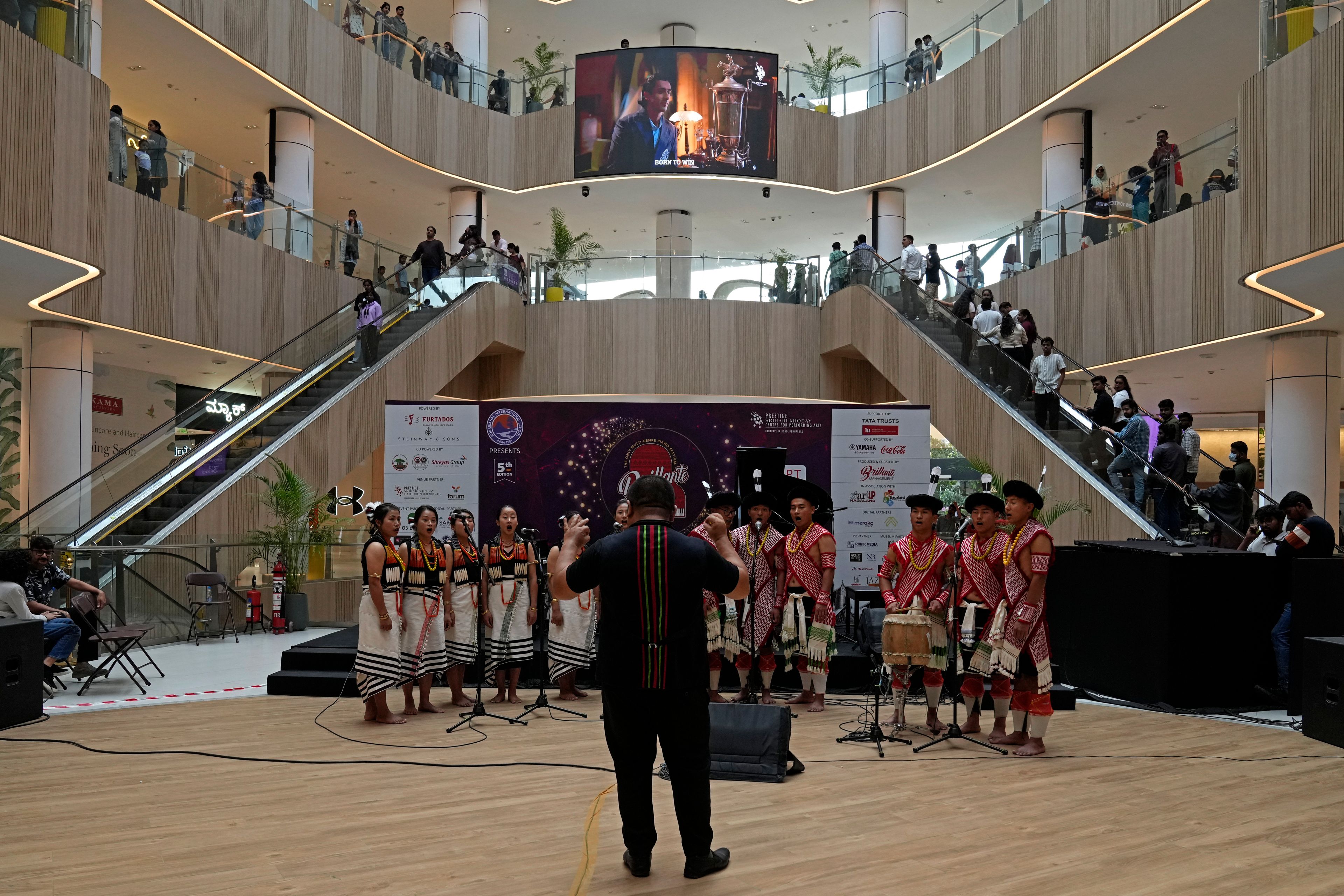 Artists from Indian's northeastern state of Nagaland perform at a shopping mall during the two-day Brillante Piano Festival in Bengaluru, India, Sunday, Sept. 29, 2024. (AP Photo/Aijaz Rahi)