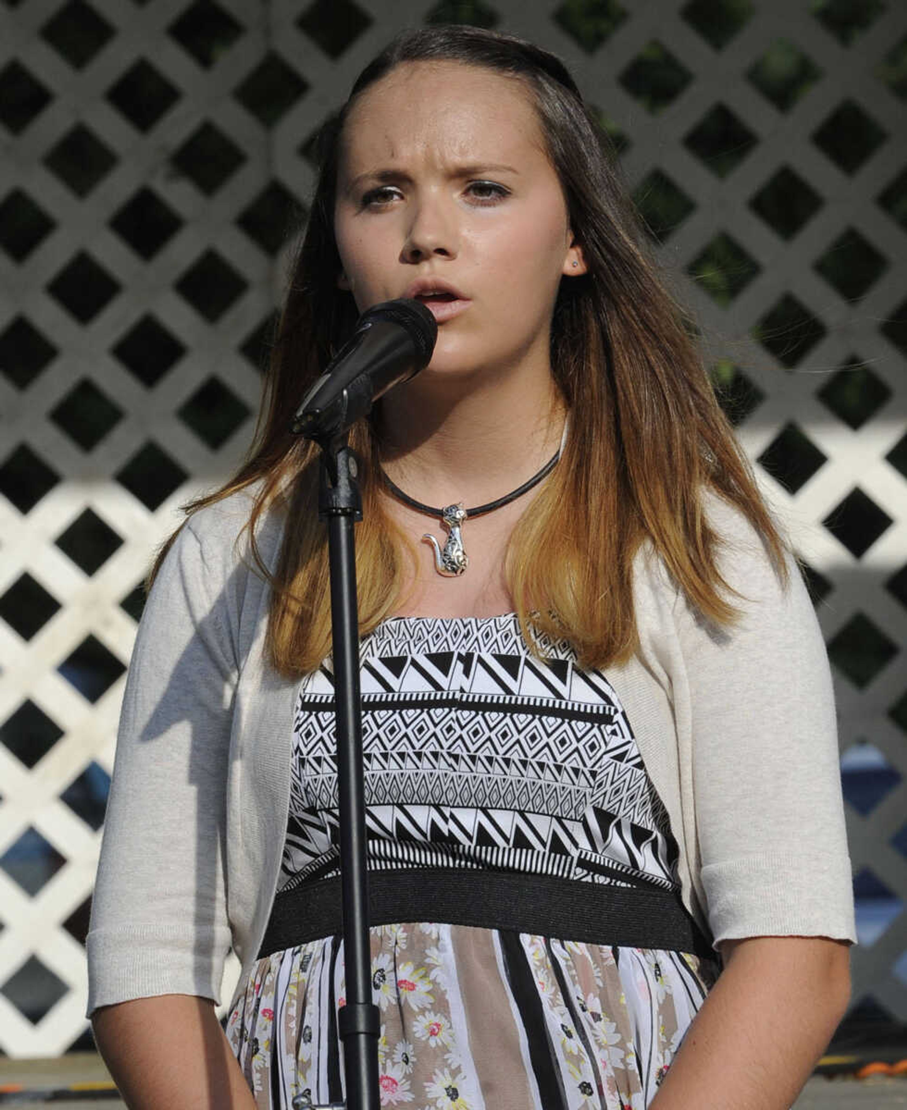 FRED LYNCH ~ flynch@semissourian.com
Brittany Heath performs "The Rose" in the Heartland Talent Showcase at German Days on Saturday, Aug. 9, 2014 at Frisco Park in Chaffee, Missouri.