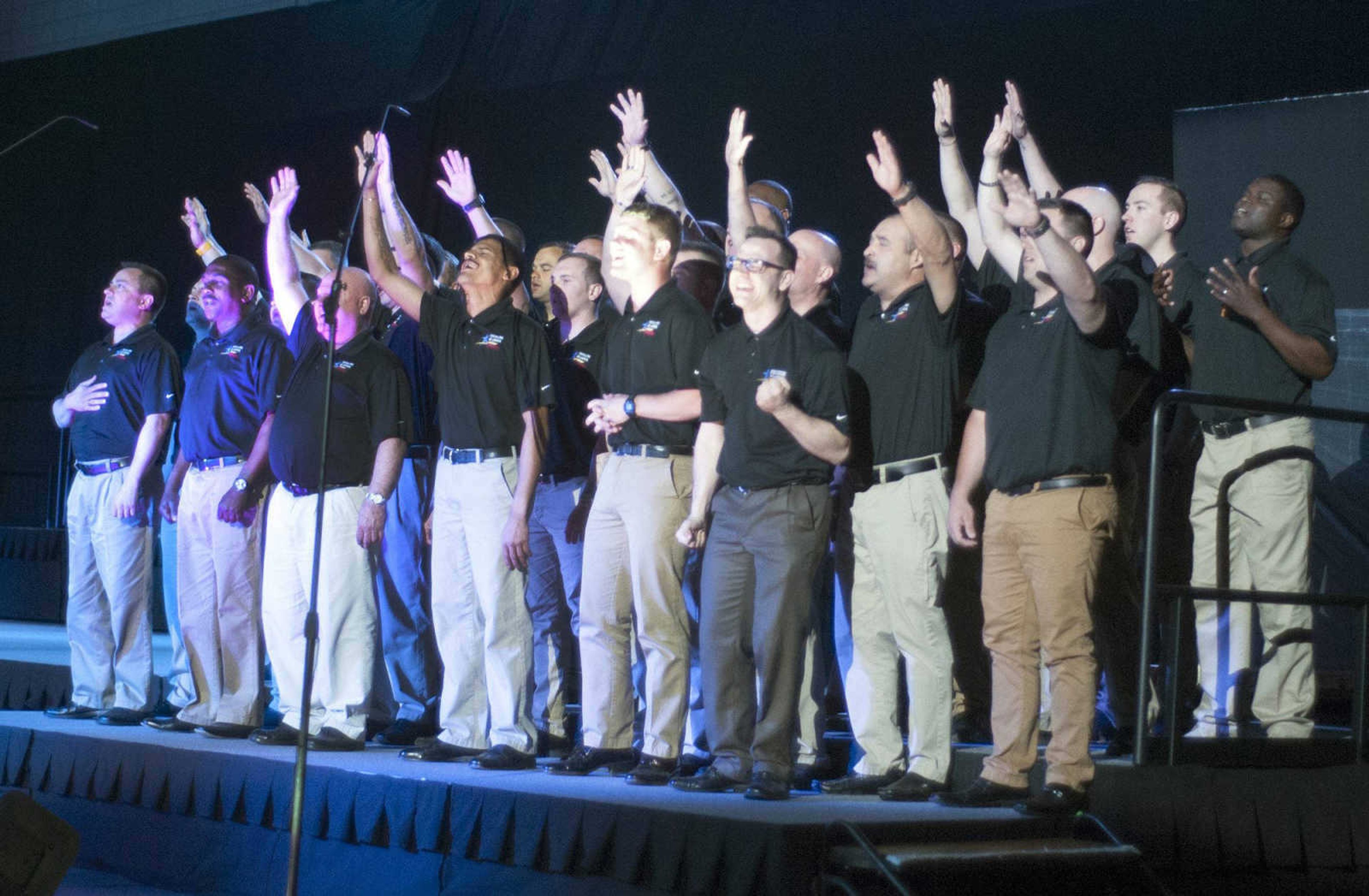 Adult and Teen Challenge Mid-America worship team is seen at the Adult and Teen Challenge Mid-America annual spring banquet Saturday at the Show Me Center in Cape Girardeau.