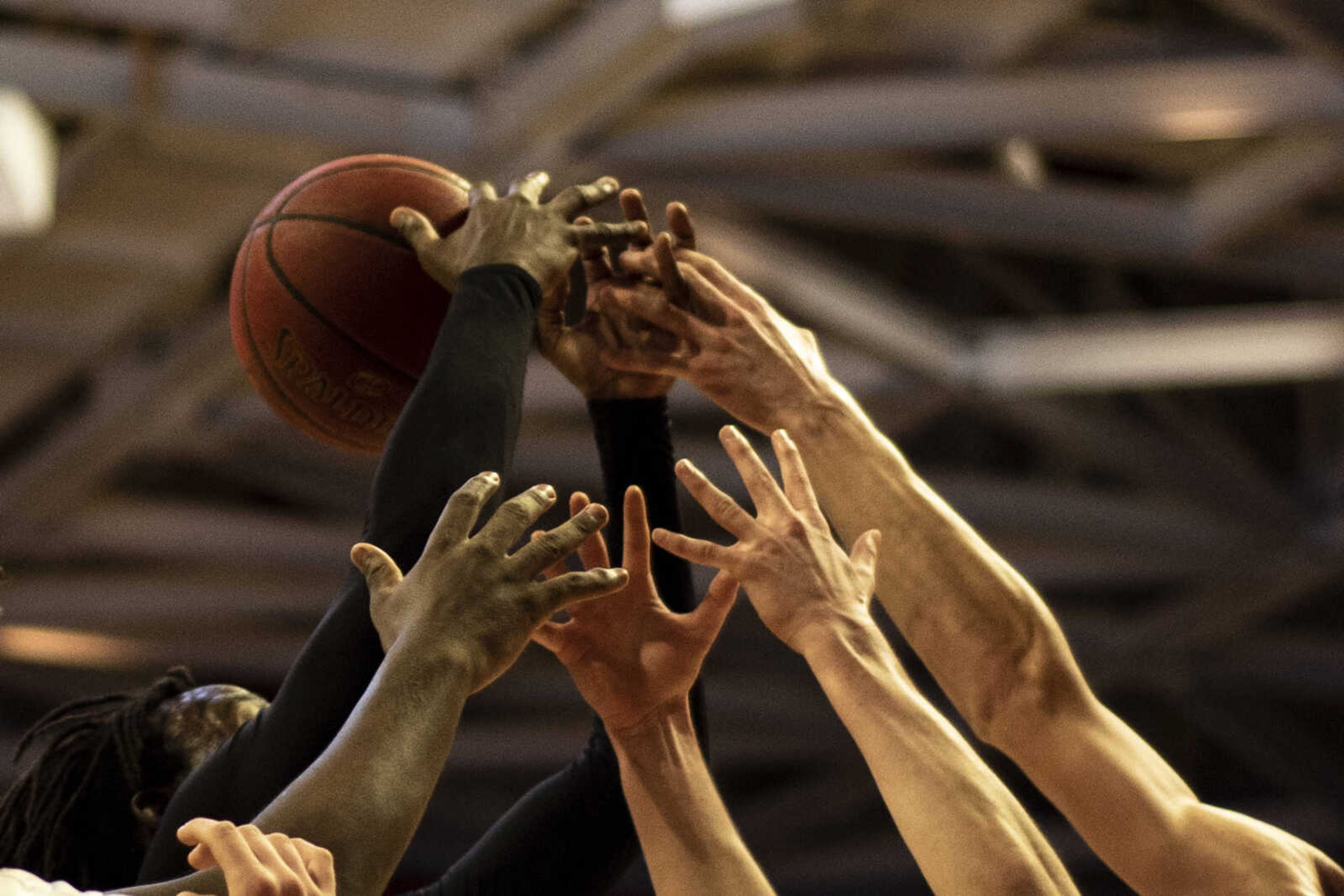 Players from Oak Ridge and Scott Central all reach for the ball during the Southeast Missourian Christmas Tournament Wednesday, Dec. 26, 2018, at the Show Me Center in Cape Girardeau.