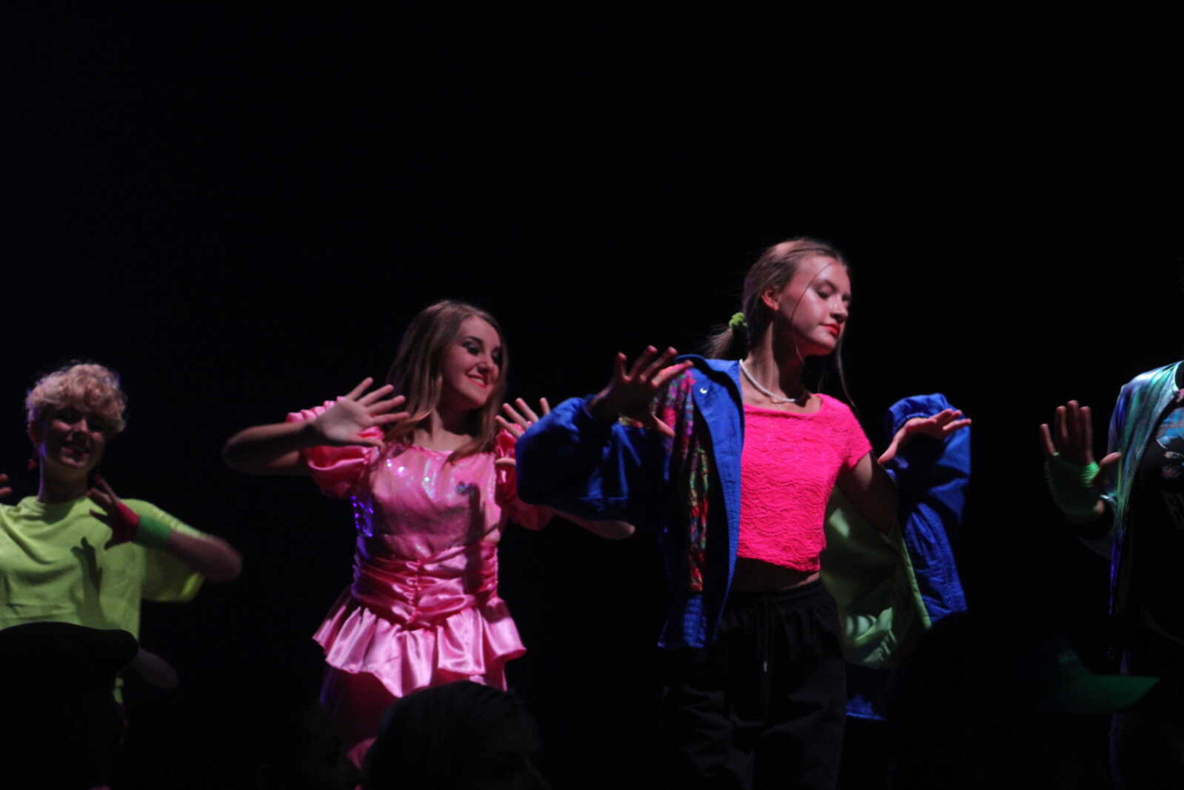 Community women perform as models and dancers in the 11th VintageNOW fashion show Saturday, Oct. 9, 2021, at the Show Me Center in Cape Girardeau.