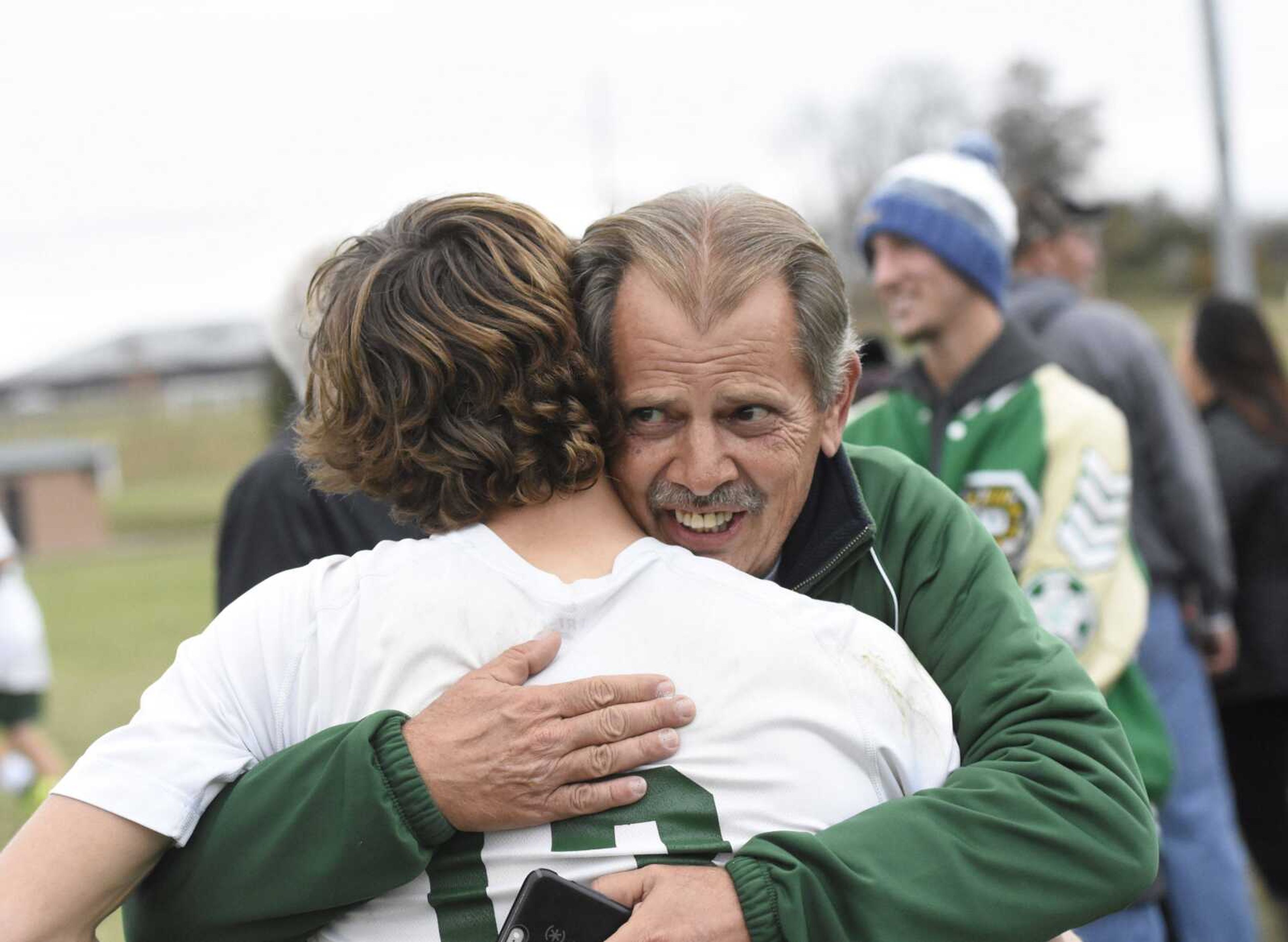 Perryville coach Jerry Fulton, right, hugs Kyle Wood after winning a Class 2 state quarterfinal over Bishop DuBourg on Saturday in Perryville, Missouri. (Ben Striker ~ Special to the Southeast Missourian)