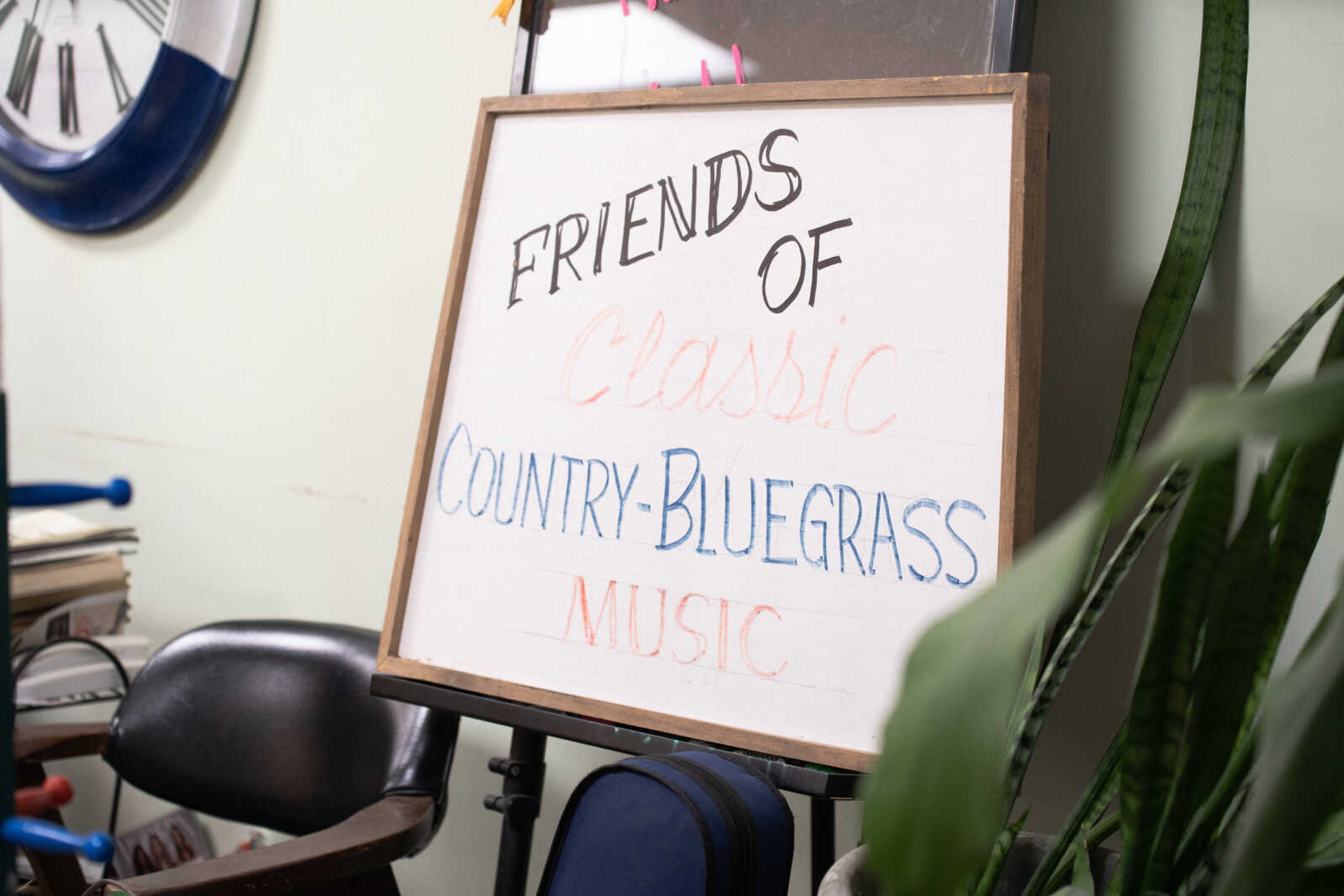 A sign announcing the jam sessions sits in Hombre Barber Shop in Cape Girardeau. Owner Gene Penny says he enjoys carrying on the tradition of the music circle. 