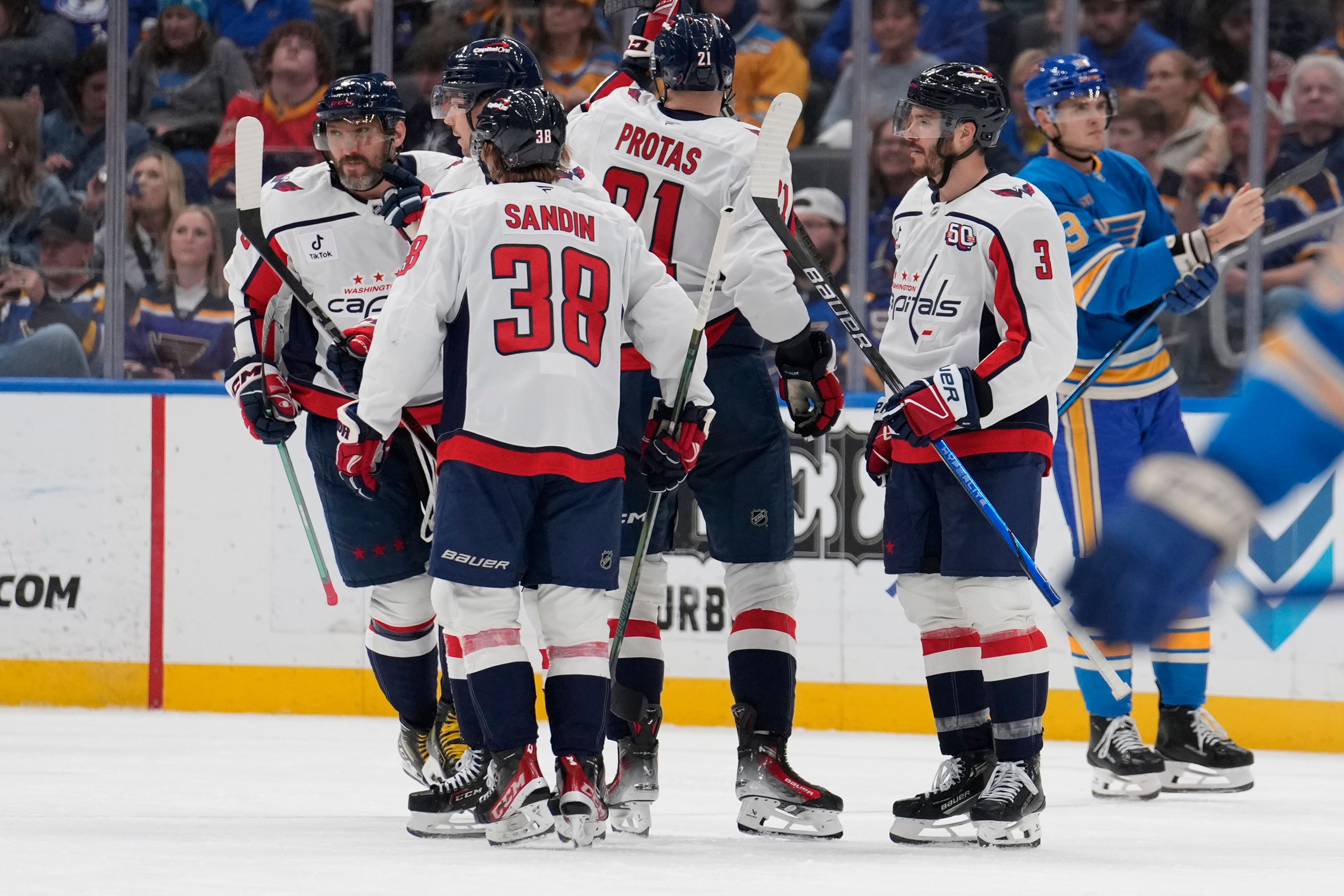 Washington Capitals' Alex Ovechkin, left, is congratulated by teammates after scoring during the second period of an NHL hockey game against the St. Louis Blues Saturday, Nov. 9, 2024, in St. Louis. (AP Photo/Jeff Roberson)