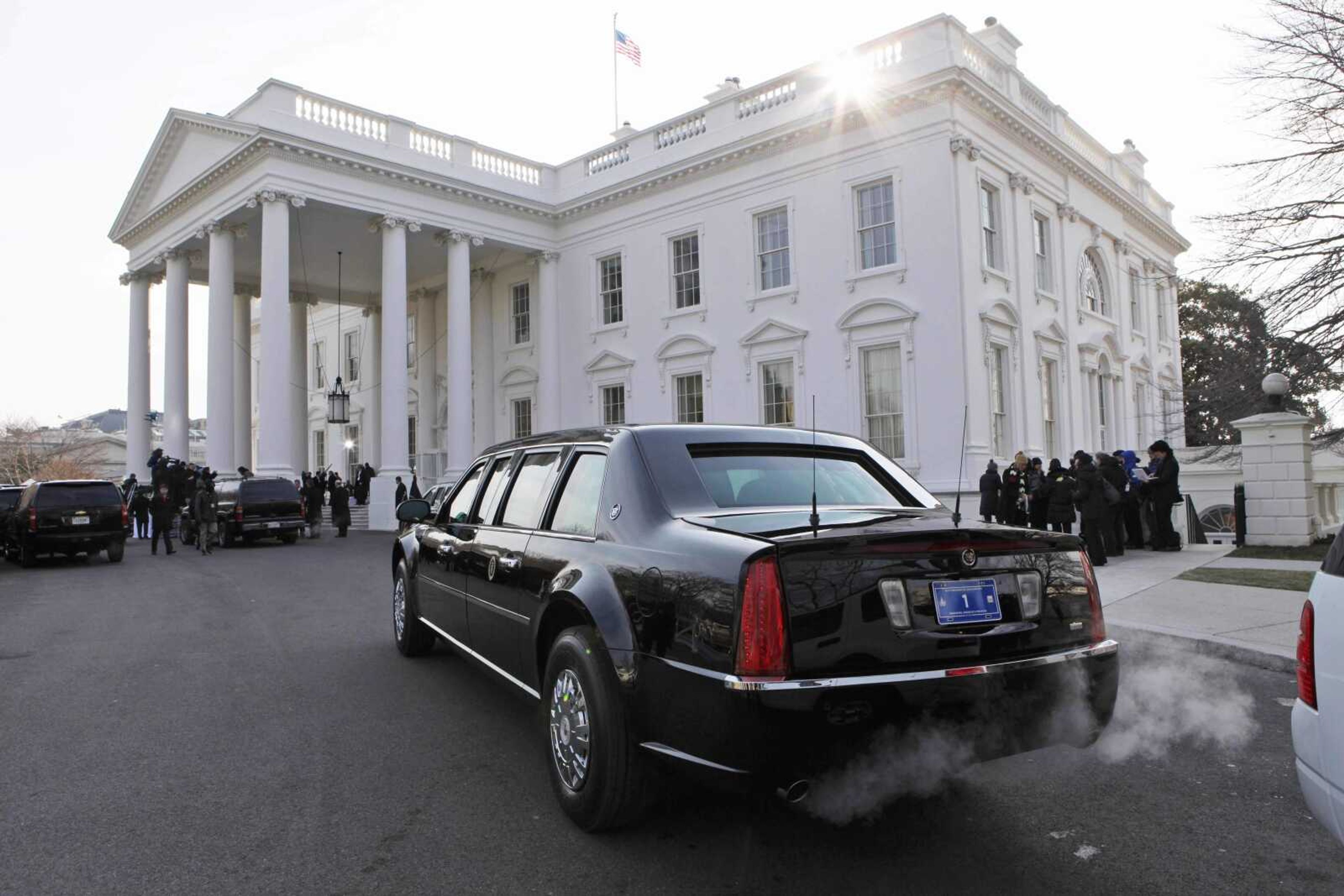 The new presidential limousine is parked on the north driveway of the White House before it transports President George W. Bush and President-elect Barack Obama to the inauguration ceremony at the Capitol in Washington, Tuesday, Jan. 20, 2009. (AP Photo/Charles Dharapak)